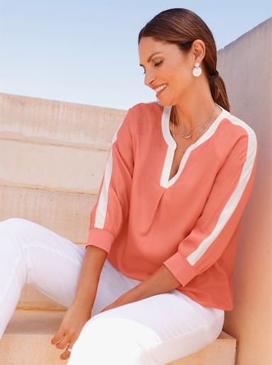 Comfortblouse met contrastinzetten - koraal