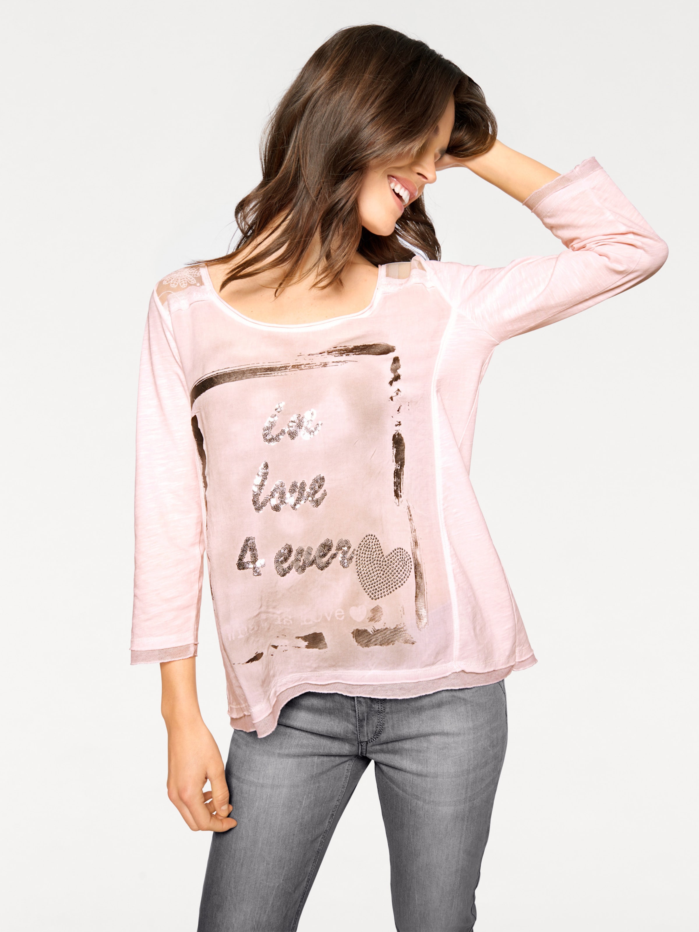 Rosa günstig Kaufen-Druck-Shirt in rosa von heine. Druck-Shirt in rosa von heine <![CDATA[Druck-Shirt In angesagter Patch-Optik. Trageangenehmes Material. Sportlich-legerer Schnitt. Perfekt für tagsüber oder für Partys.]]>. 