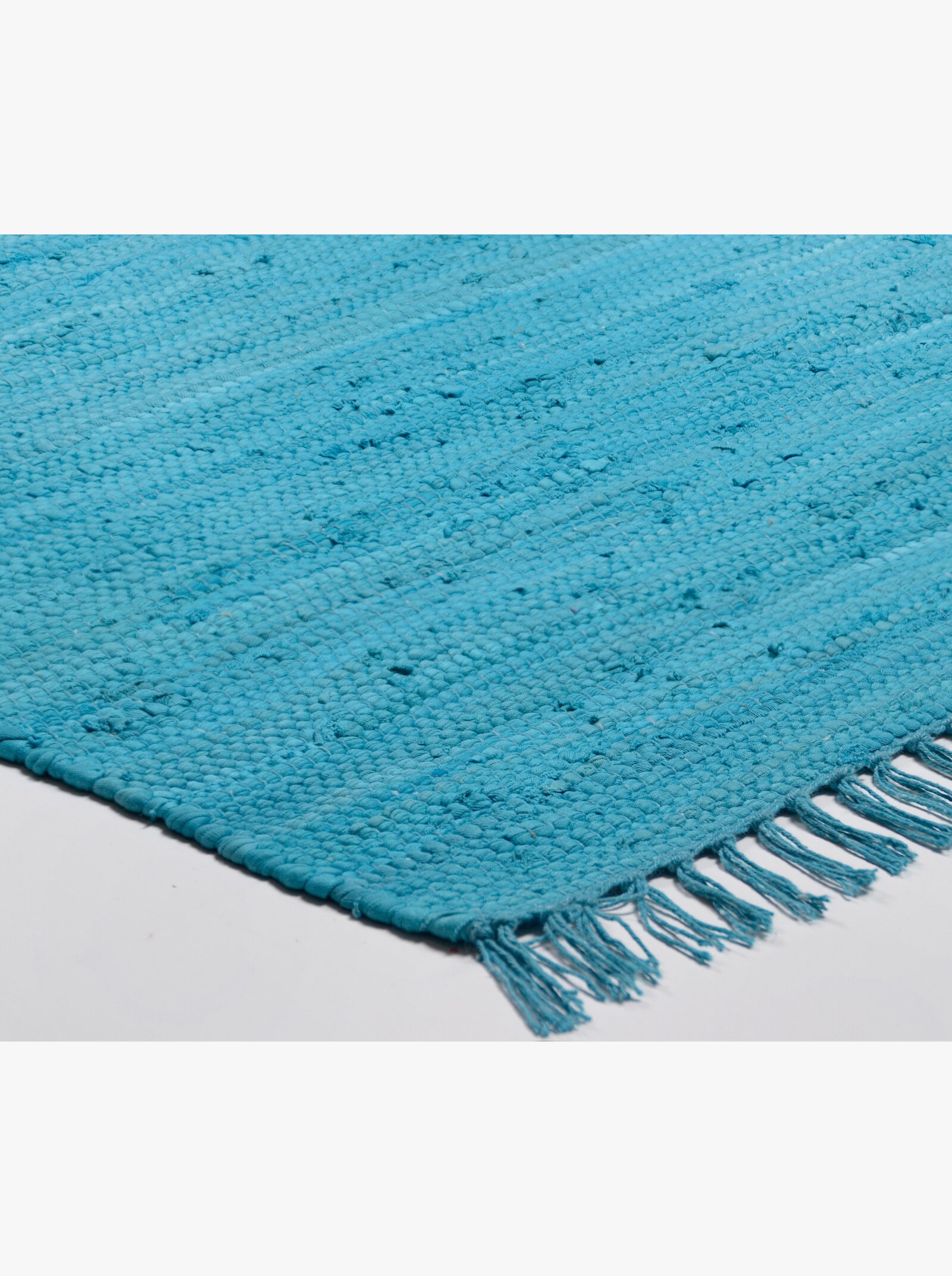 Theko Handwebteppich - türkis
