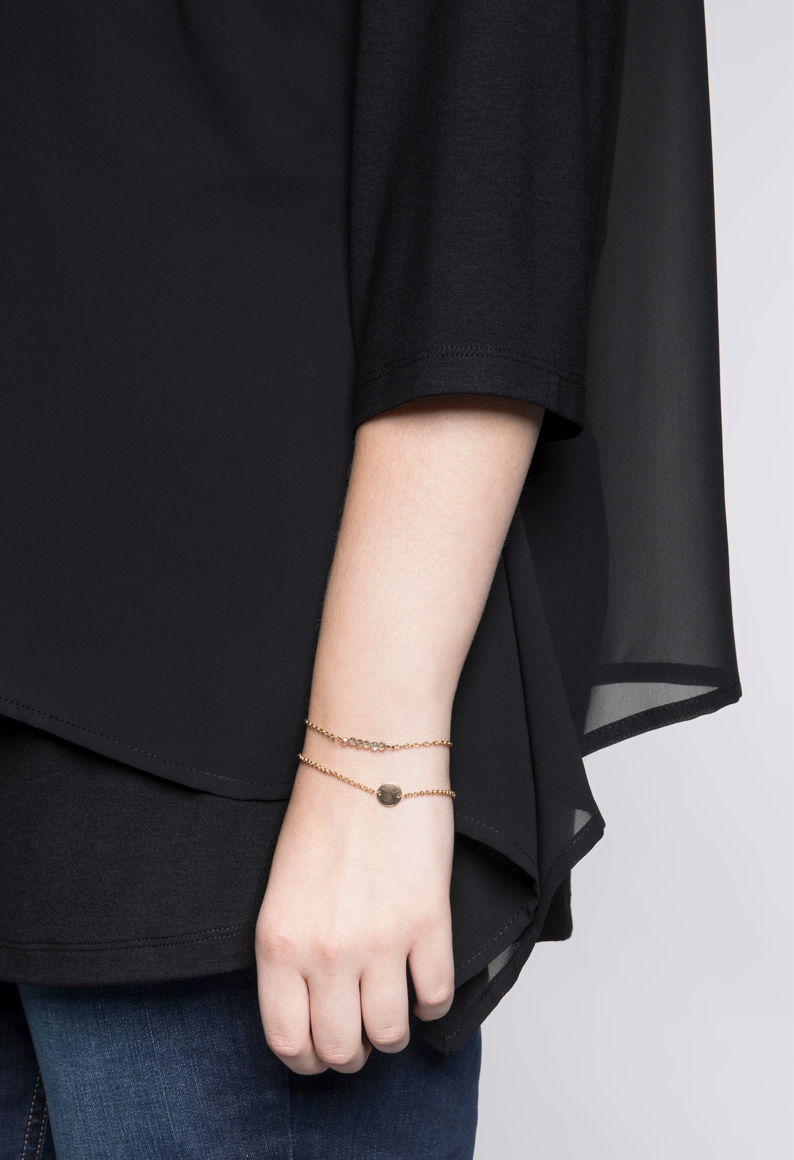 sheego Blusenshirt mit Zipfelsaum - schwarz