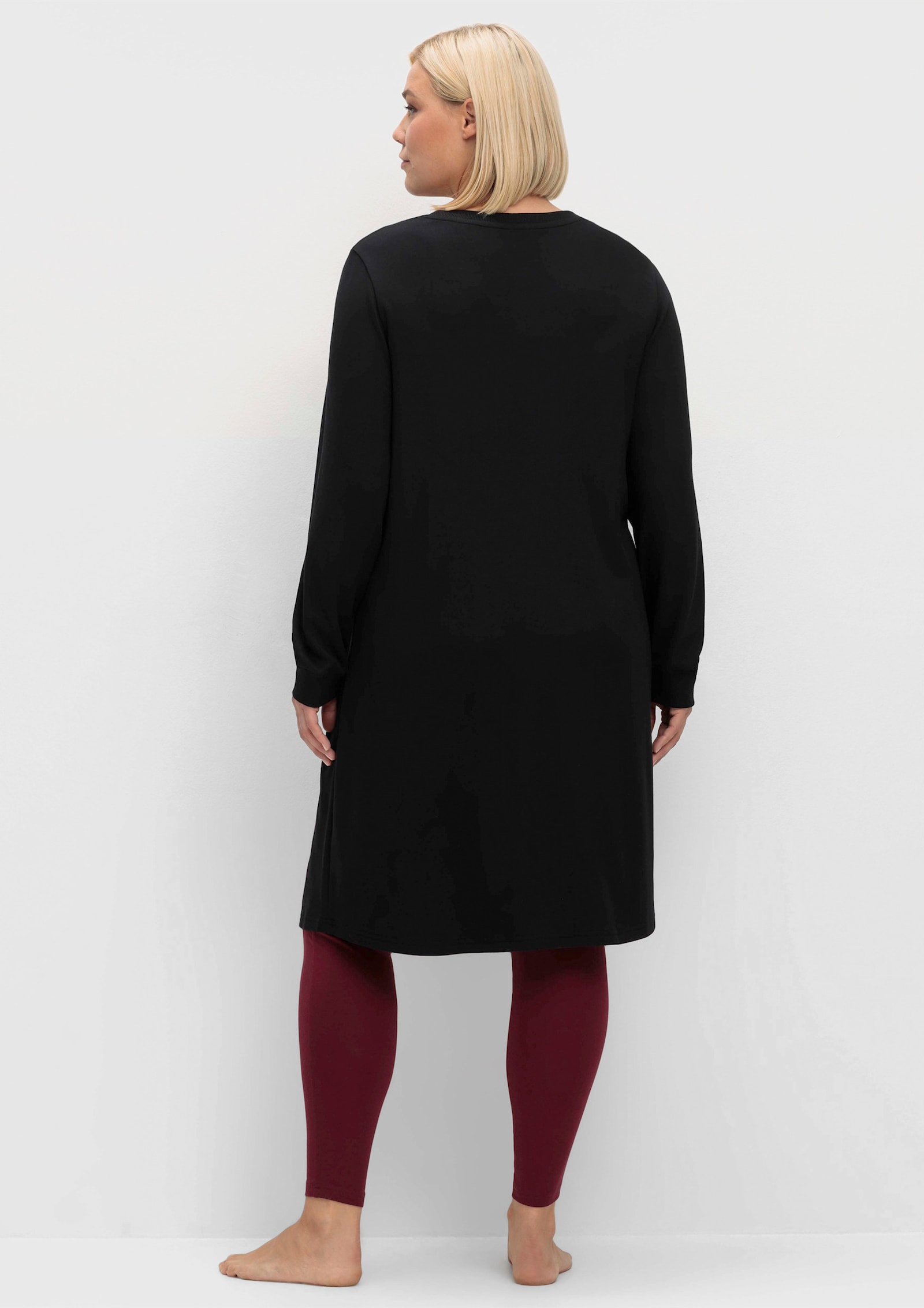 sheego Jerseykleid mit aufgesetzter Kängurutasche - schwarz