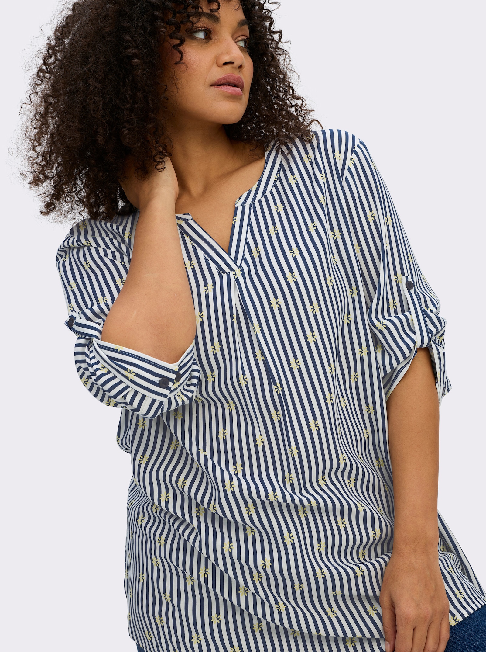 sheego Tunika im Mustermix aus Streifen und Blüten - tiefblau-ecru-gestreift