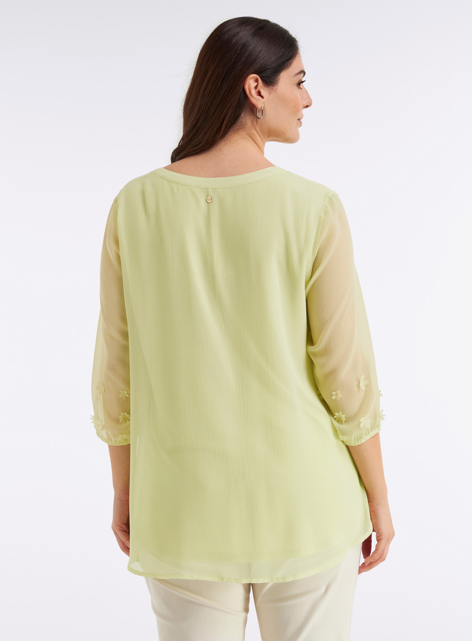 sheego Tunika mit Blüten-Applikationen am Ärmel - pistazie