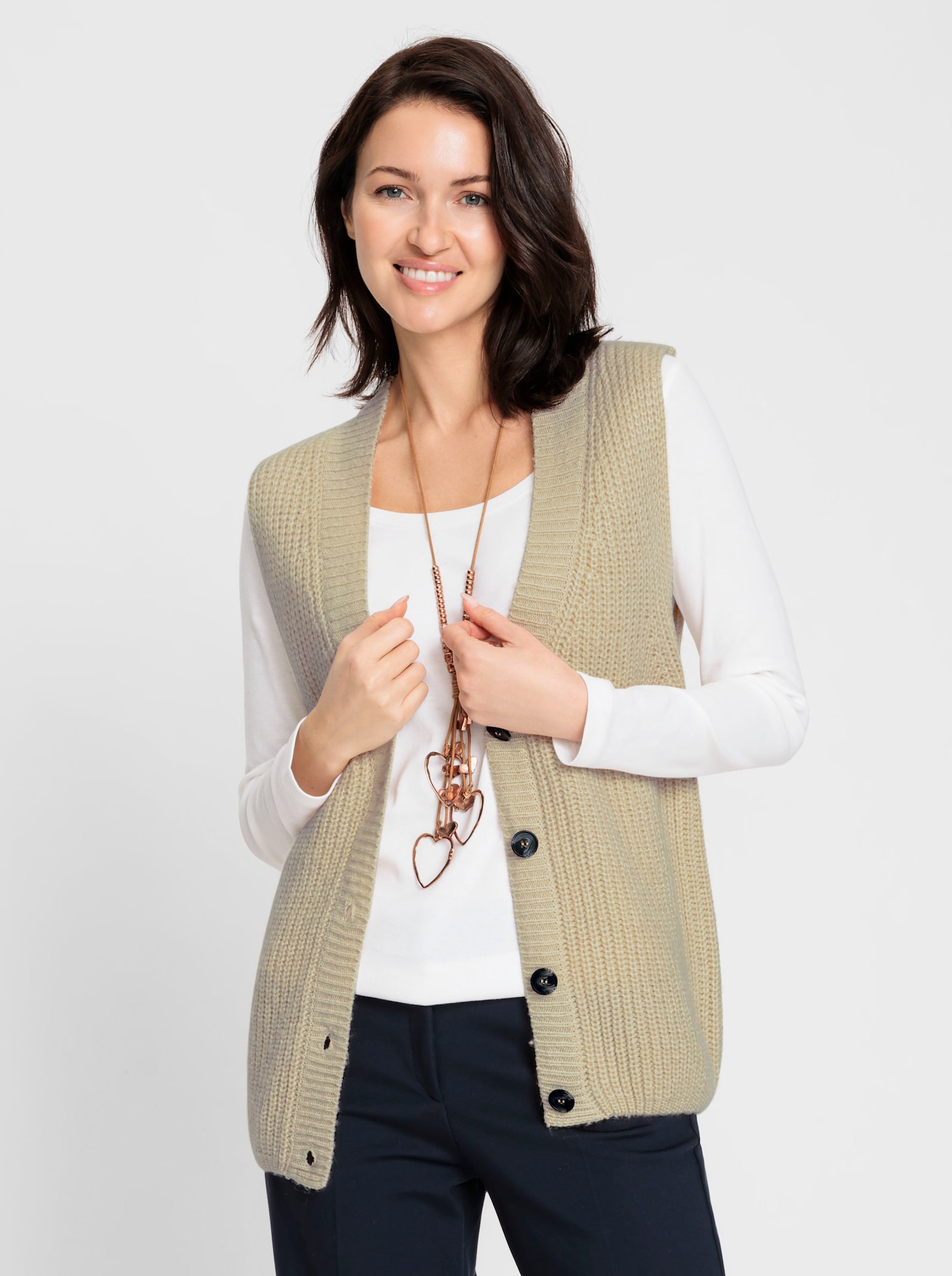 Mouwloos vest met knopen in houtlook - zand