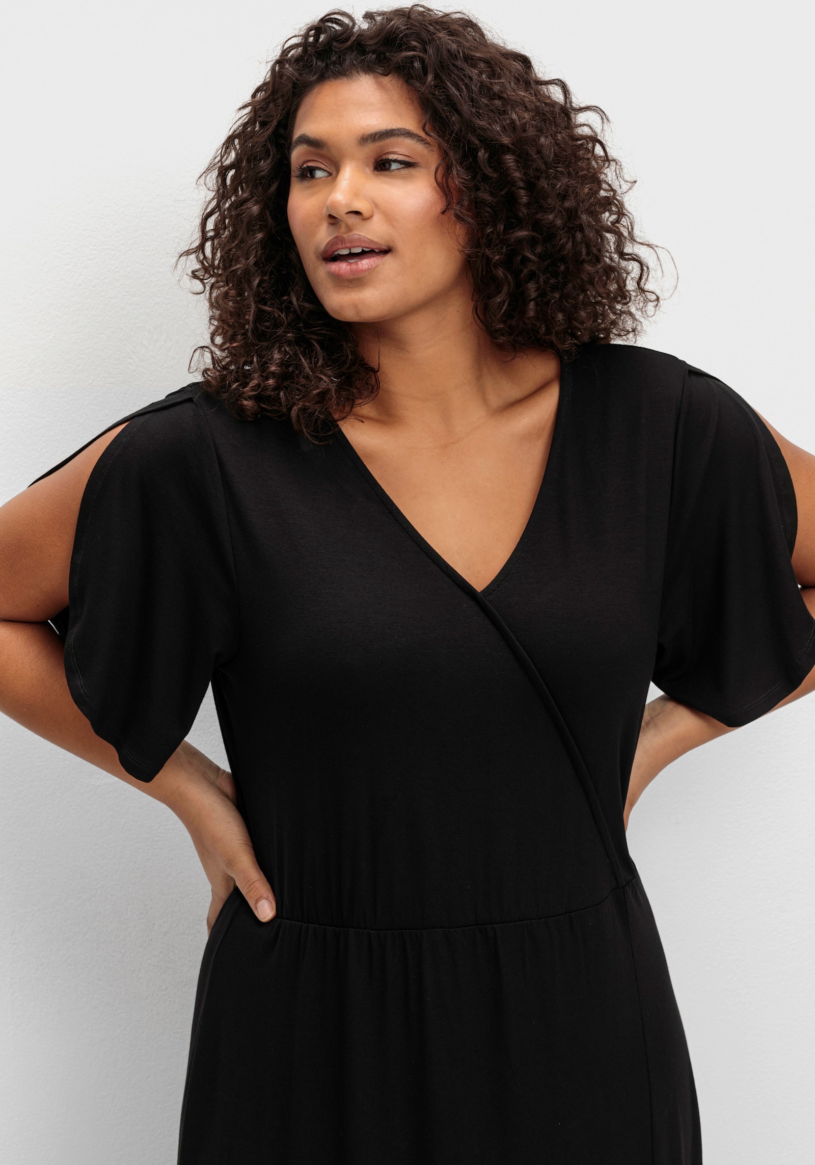 sheego Jerseyjurk in wikkellook, met volantrok - zwart