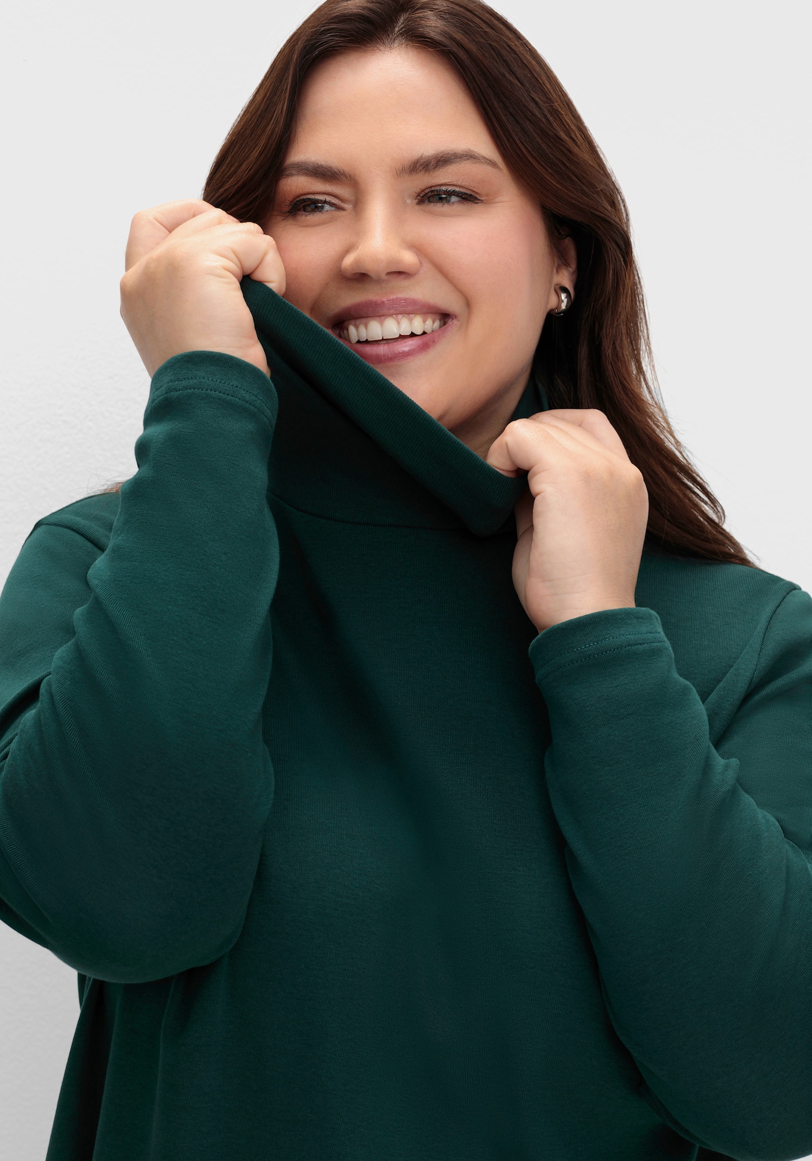 sheego Rollkragenshirt in A-Linie - tiefgrün