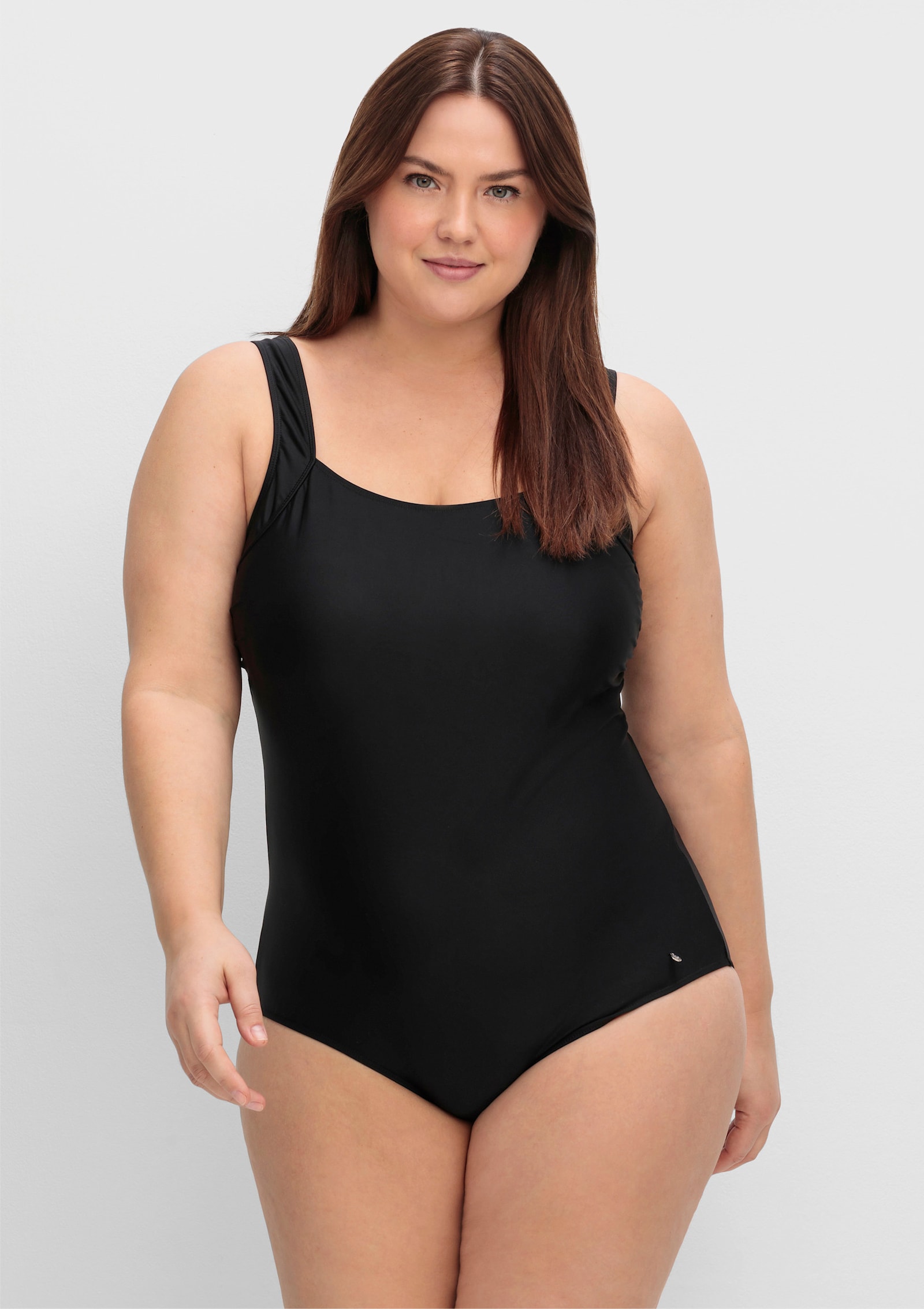 sheego Badeanzug mit Shaping-Effekt - schwarz