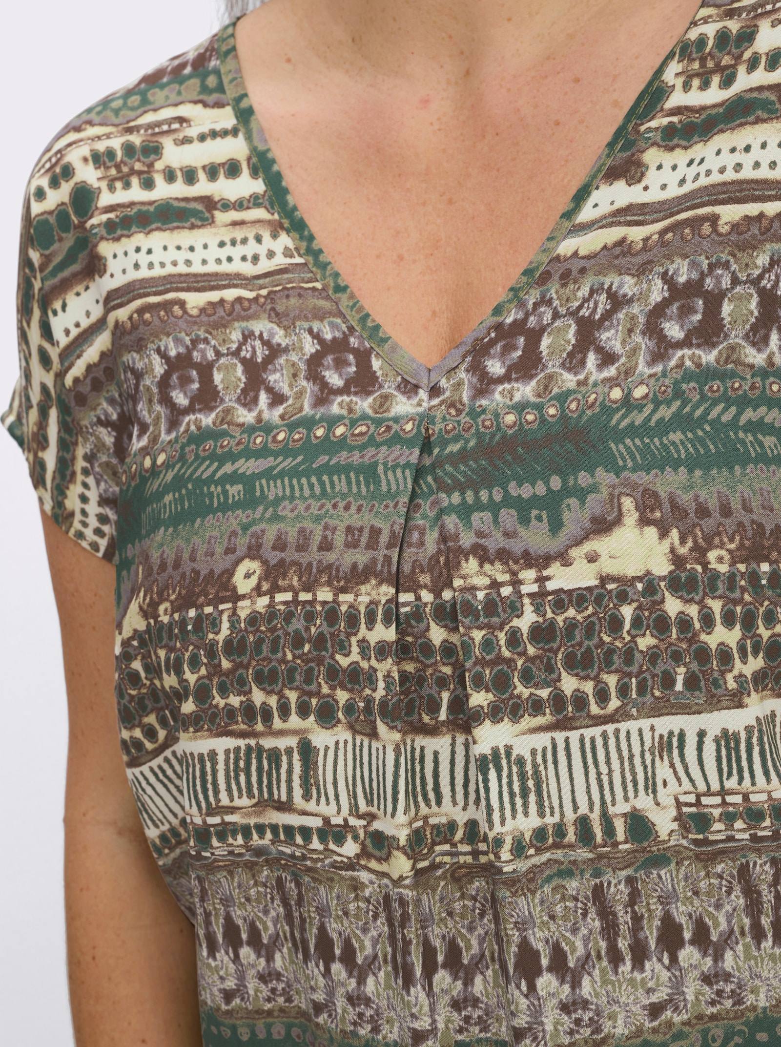 Kurzarmbluse mit schmeichelnder Falte vorne - schilf-schoko-bedruckt