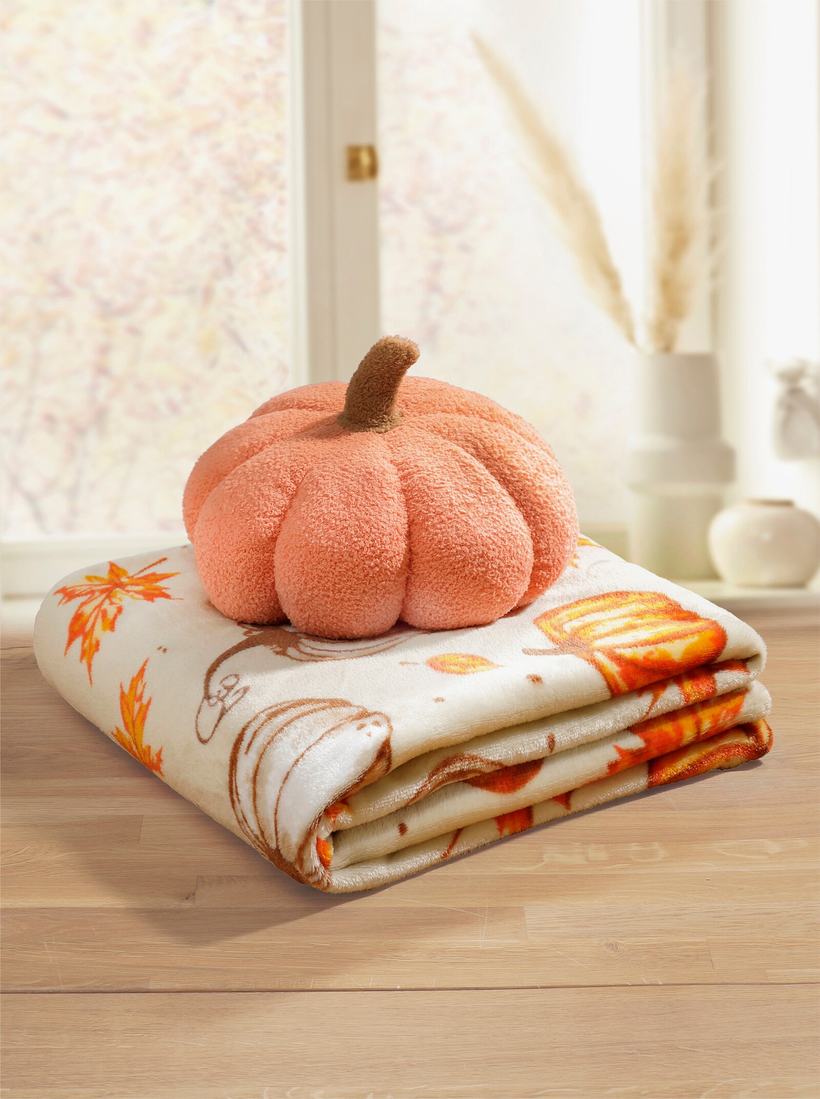 Decke mit Kissen in orange