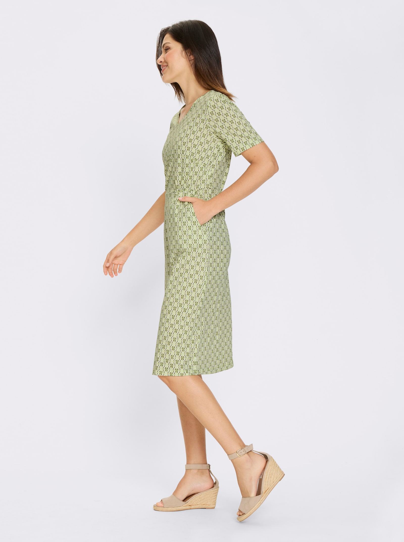 Jerseyjurk met zakken - pistache/kaki bedrukt