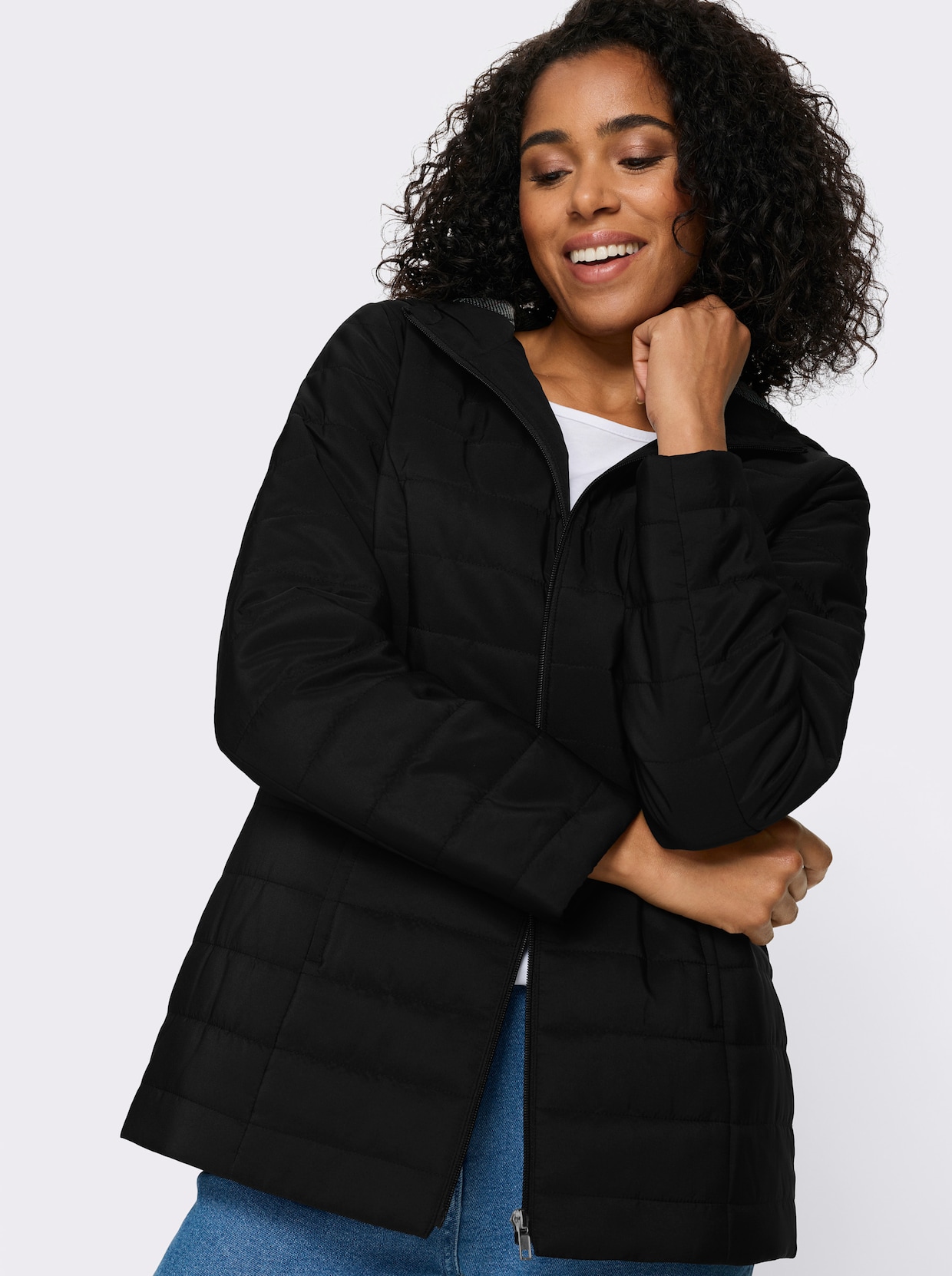 Gewatteerde jas met bedrukte voering - zwart