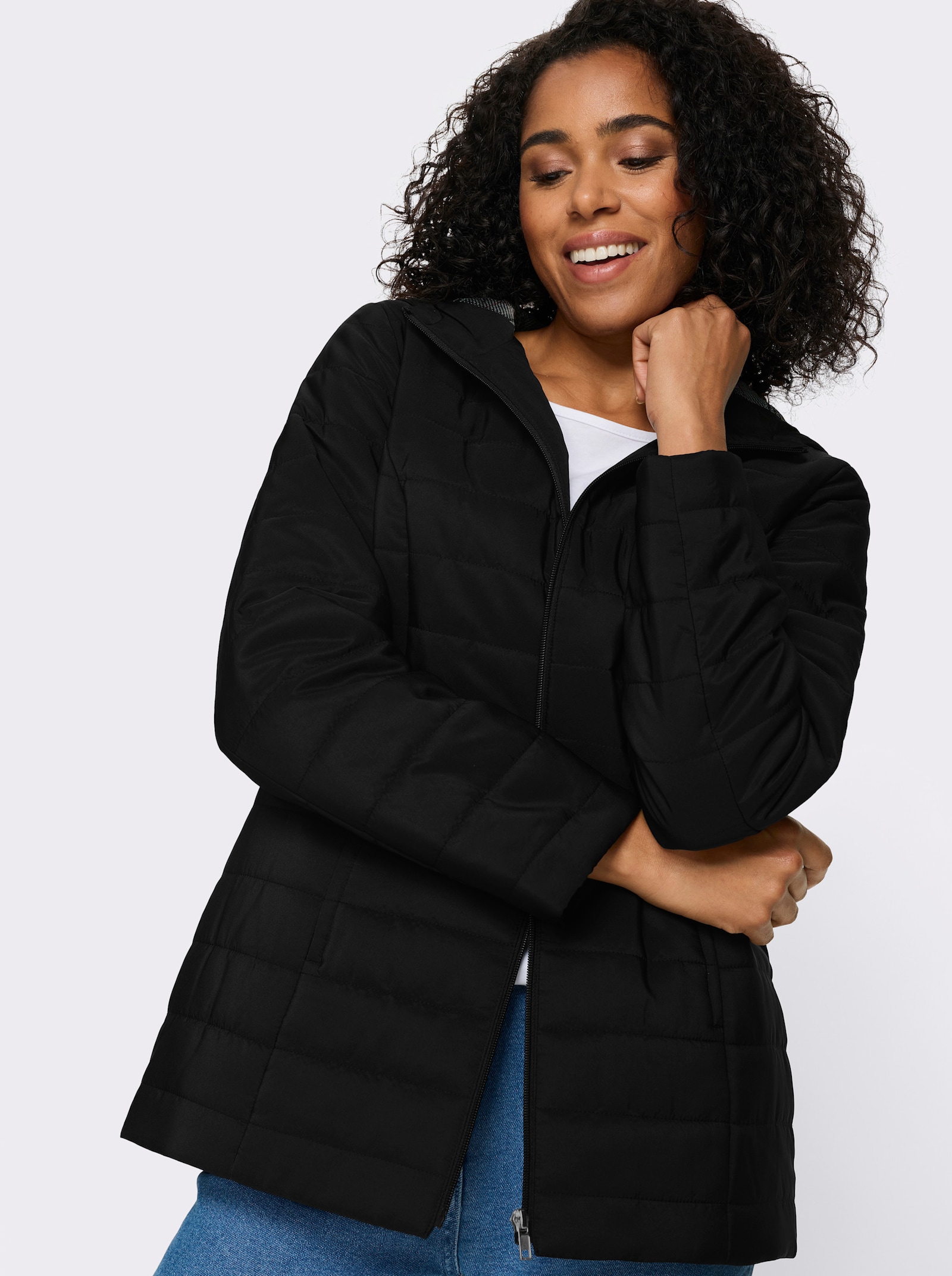 Steppjacke mit bedrucktem Futter - schwarz