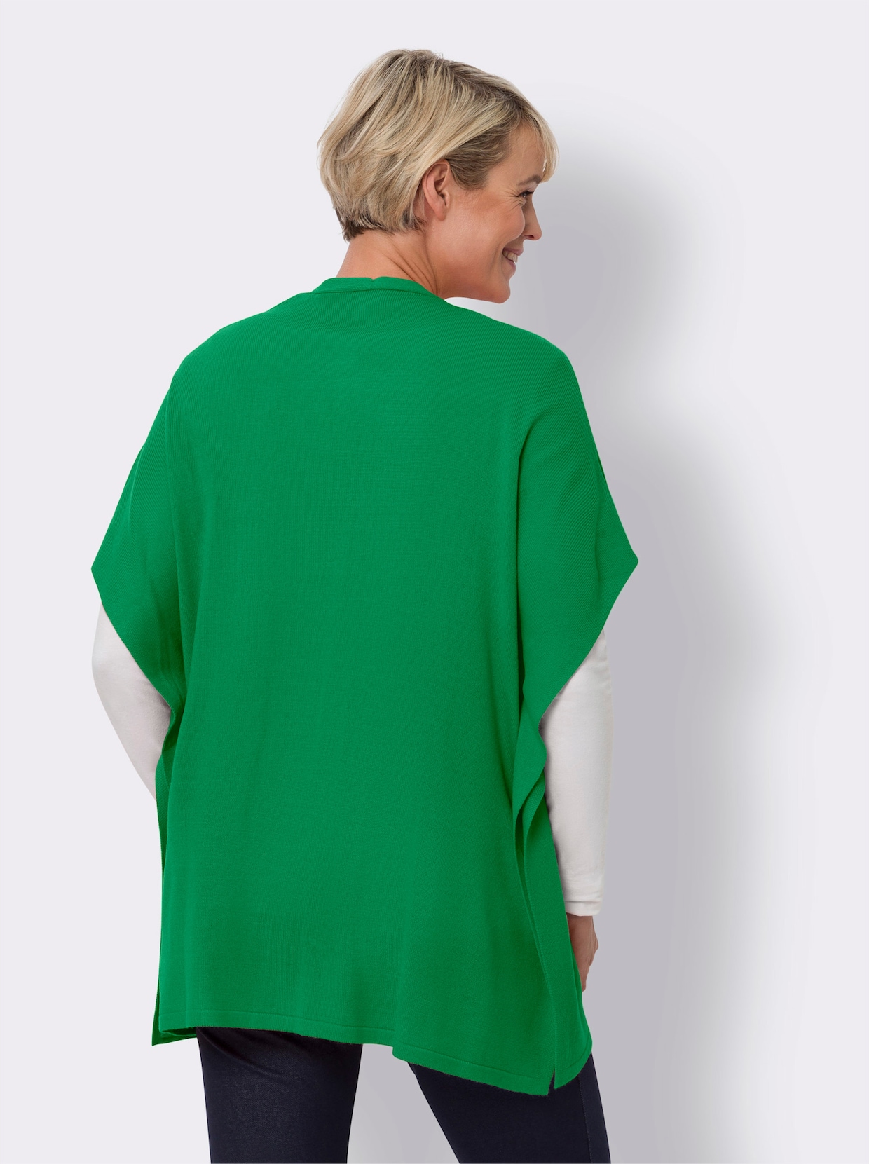 Stickad poncho - gräsgrön