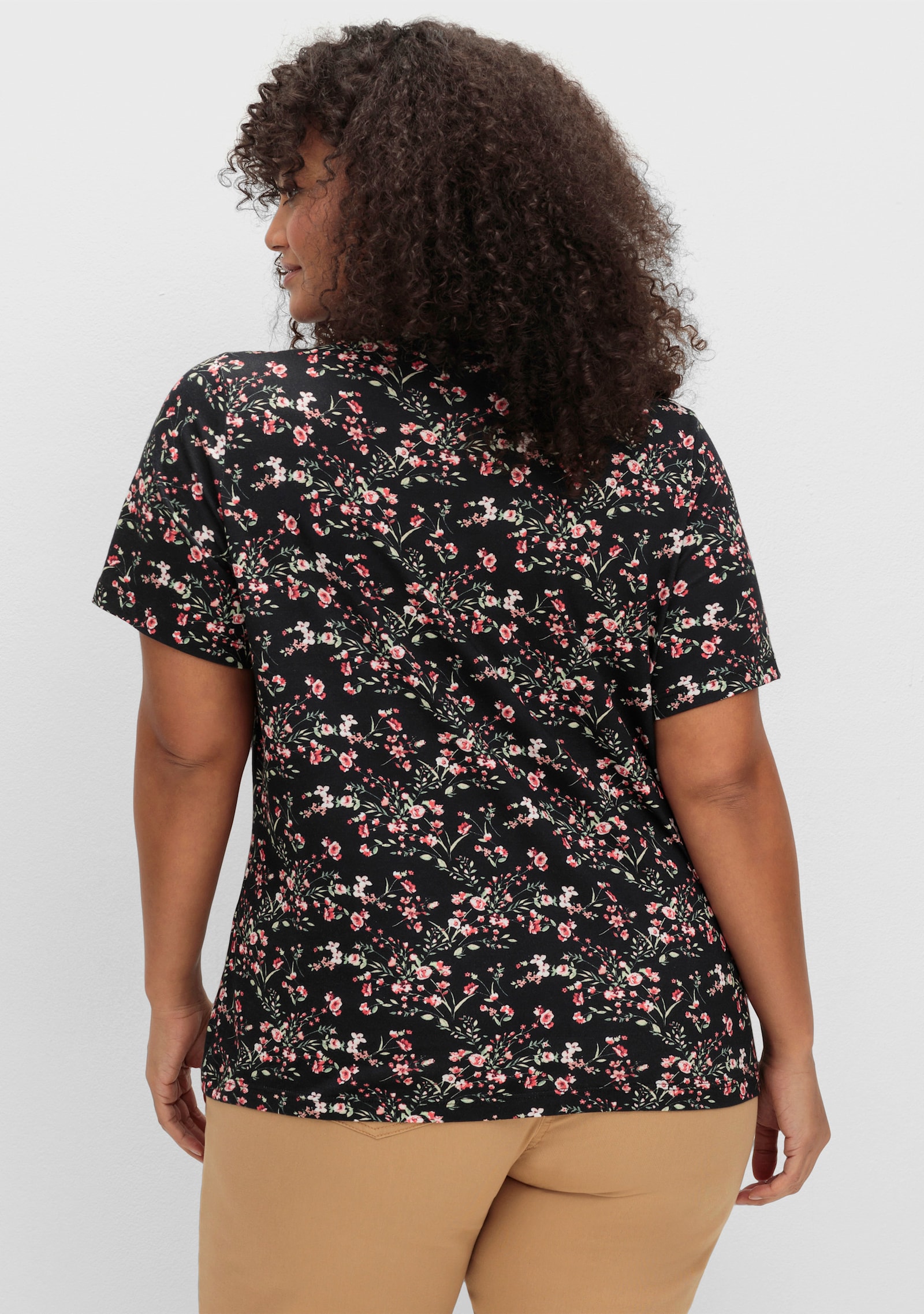 Kurzarmshirt mit Reißverschluss am Ausschnitt - schwarz-hellrosé-gemustert