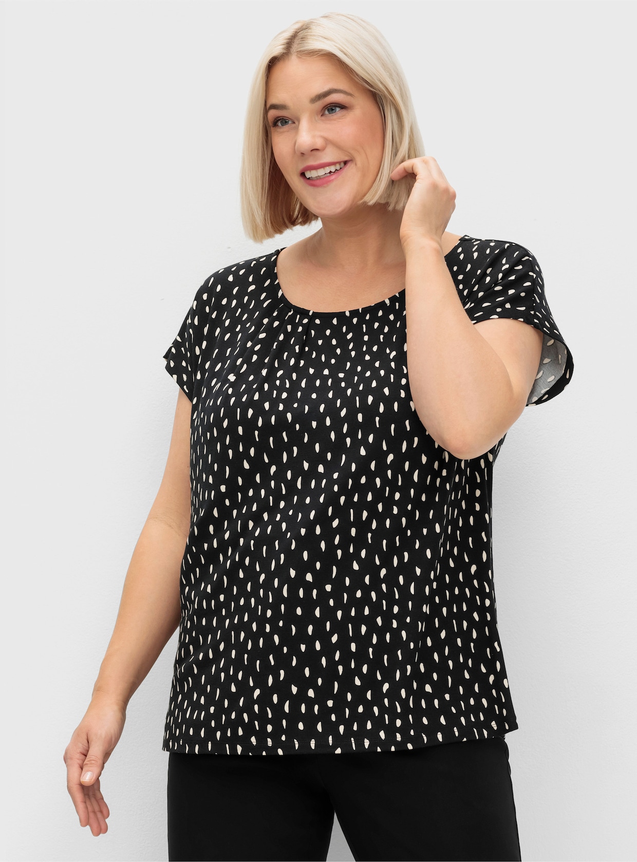 sheego Kurzarmshirt - schwarz-gemustert