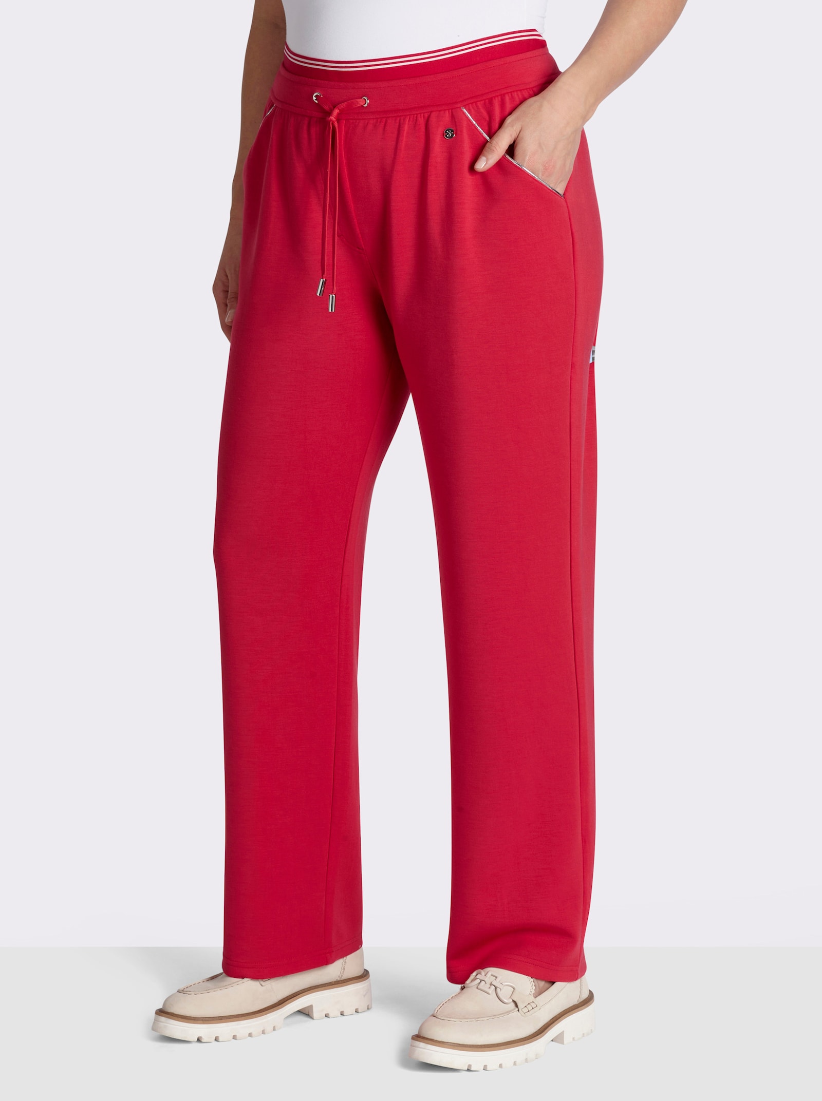 sheego Pantalon en jersey avec ceinture extensible rayée - fraise