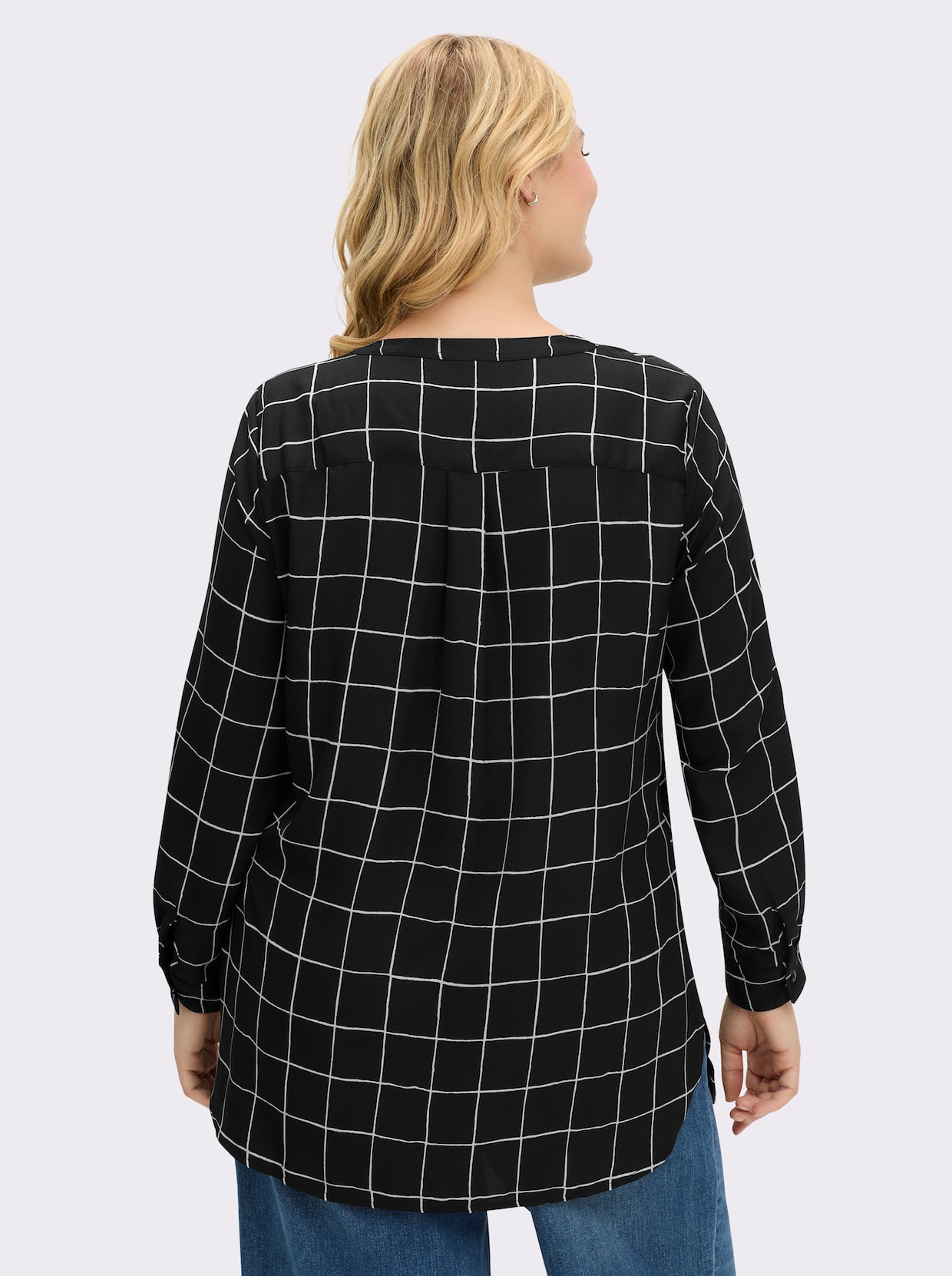 Langarm-Bluse in Longform - schwarz-weiß-kariert