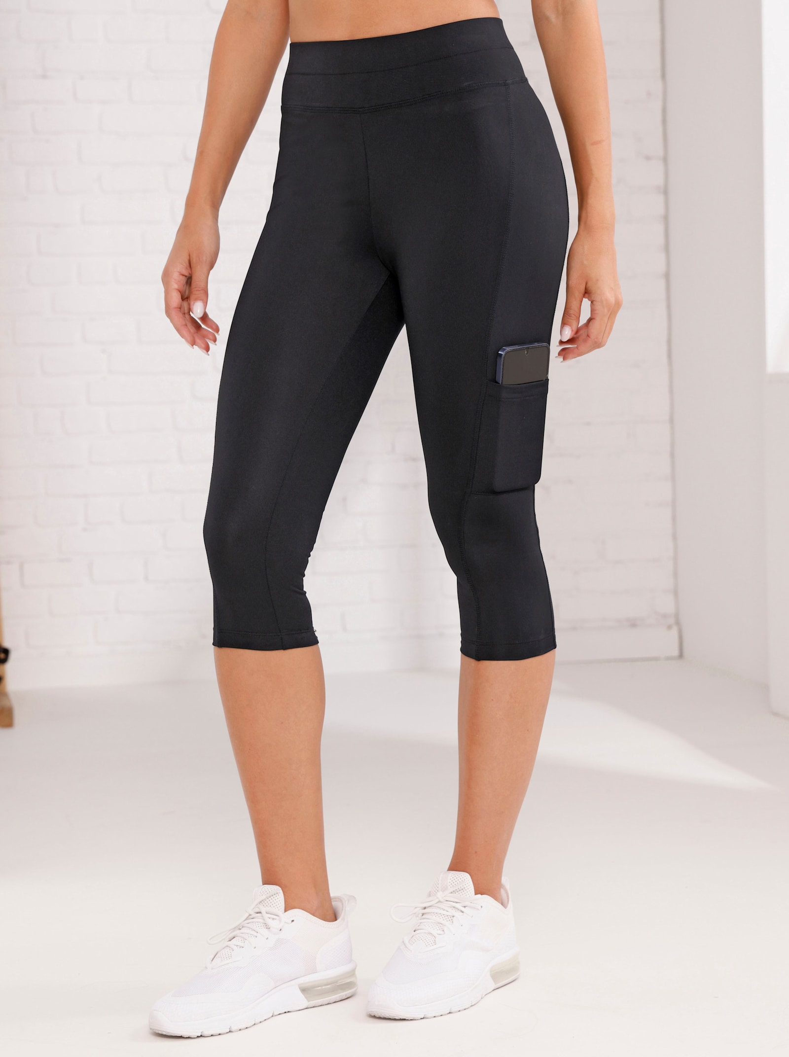 Caprilegging met een klein zakje - zwart