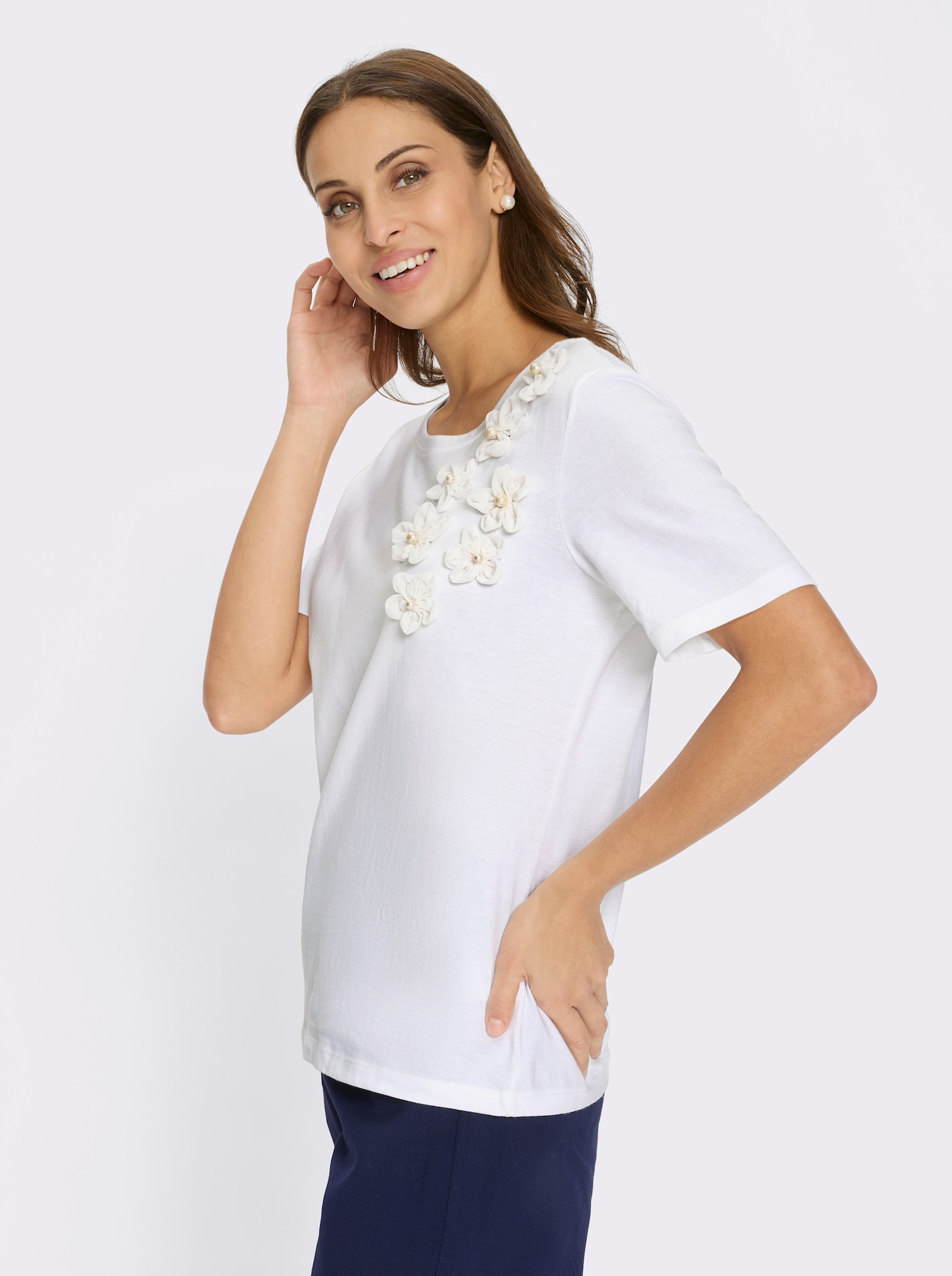 Kortärmad topp med blomapplikation - gräddvit
