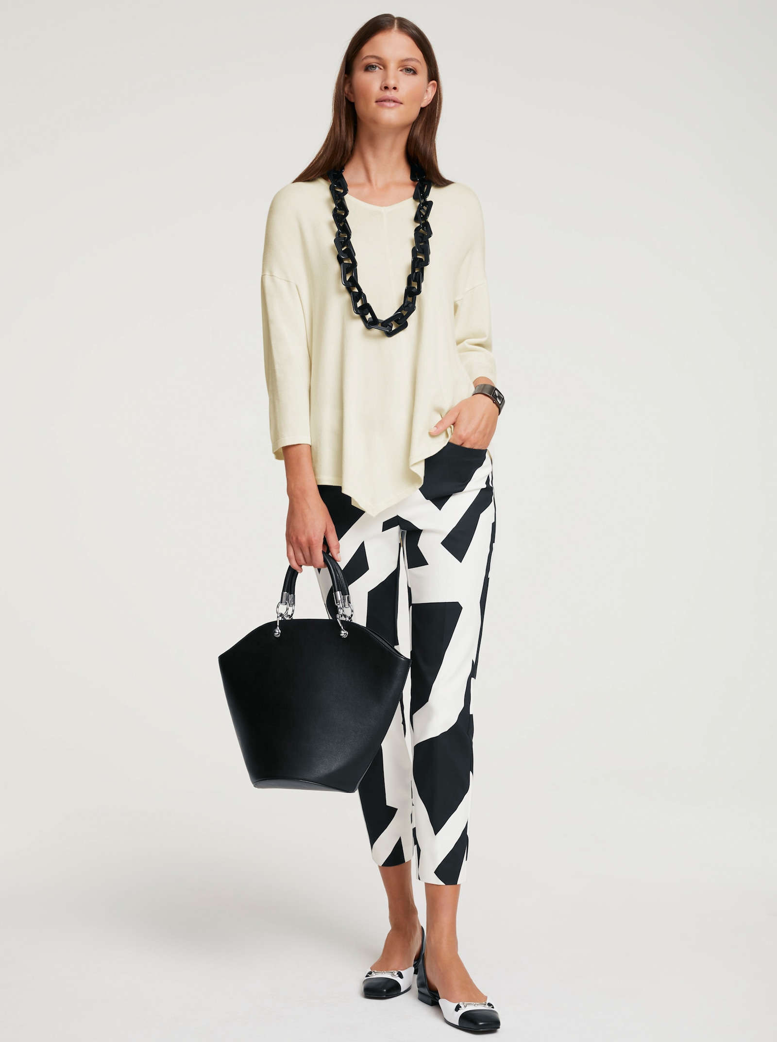 heine V-Ausschnitt-Pullover mit spitz zulaufendem Saum - ecru