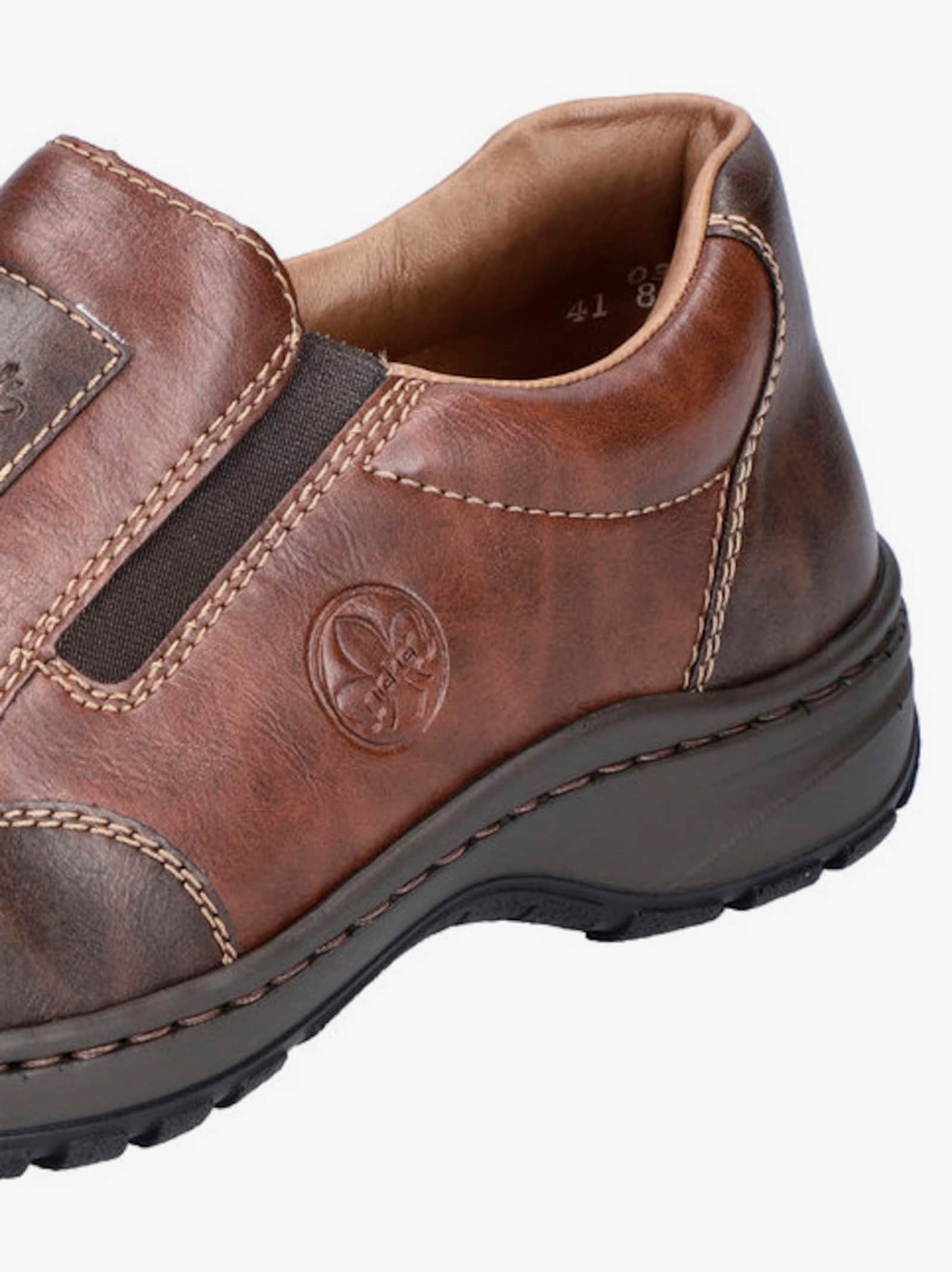 Rieker Slipper mit Wechselfußbett - braun