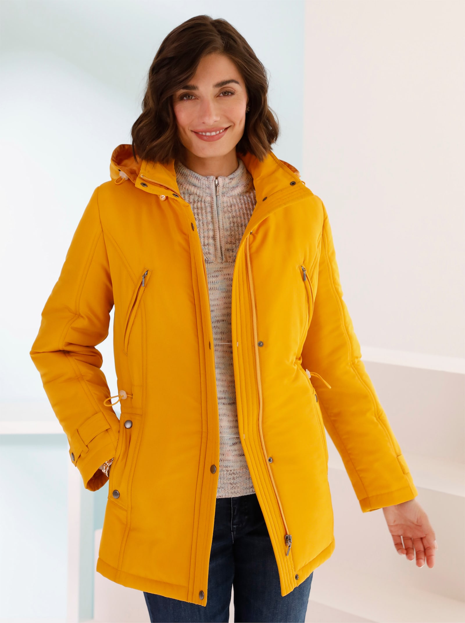 Prošívaná bunda s regulací šířky - okrová