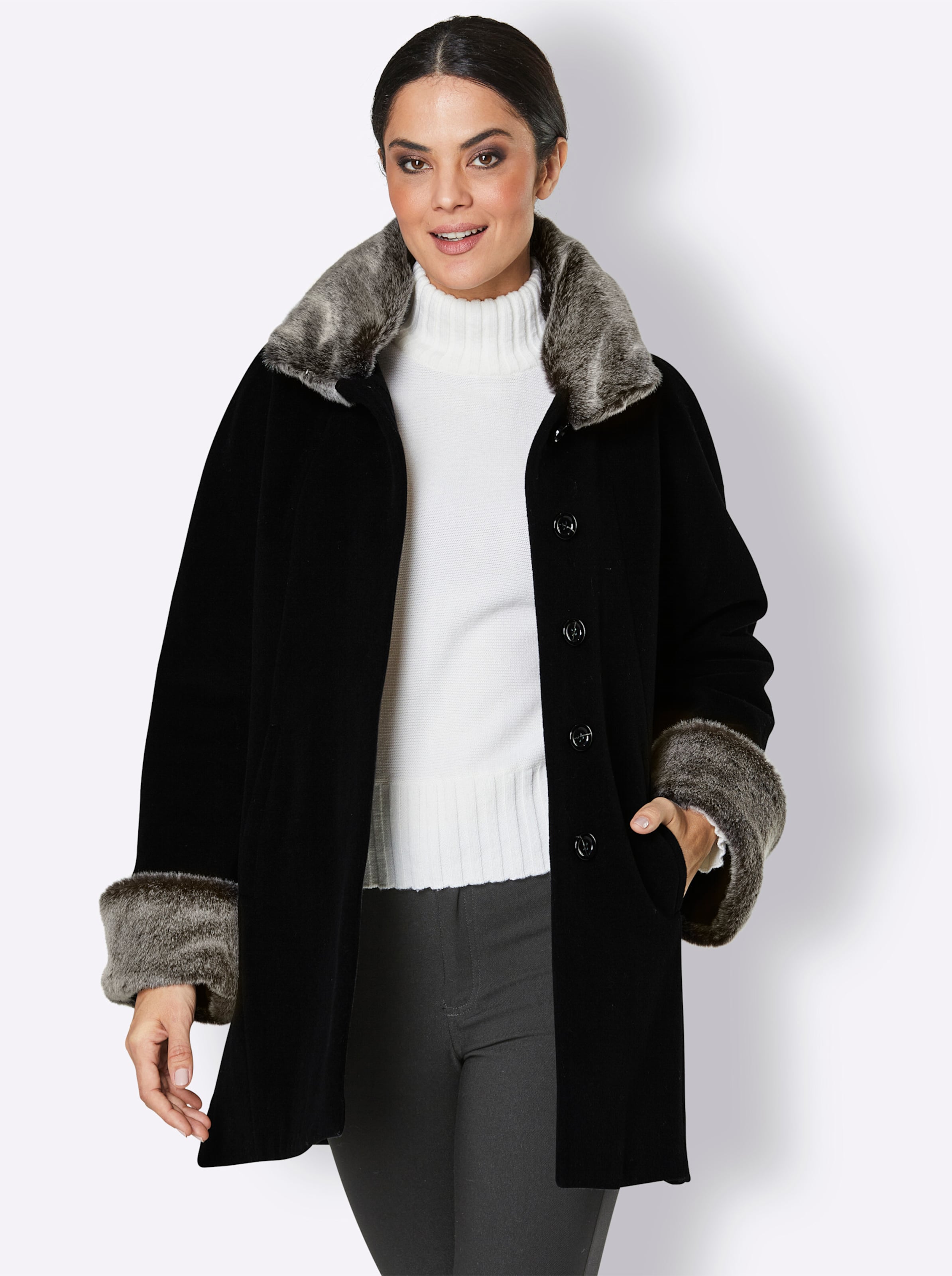 Von den  günstig Kaufen-Woll-Jacke in schwarz von Manisa. Woll-Jacke in schwarz von Manisa <![CDATA[Ein Hauch von Luxus … Woll-Jacke, das mondäne, abknöpfbare Pelz-Imitat an Stehkragen und Ärmelabschlüssen gibt diesem Modell den extravaganten Look. In Cape-Optik, ausgestel