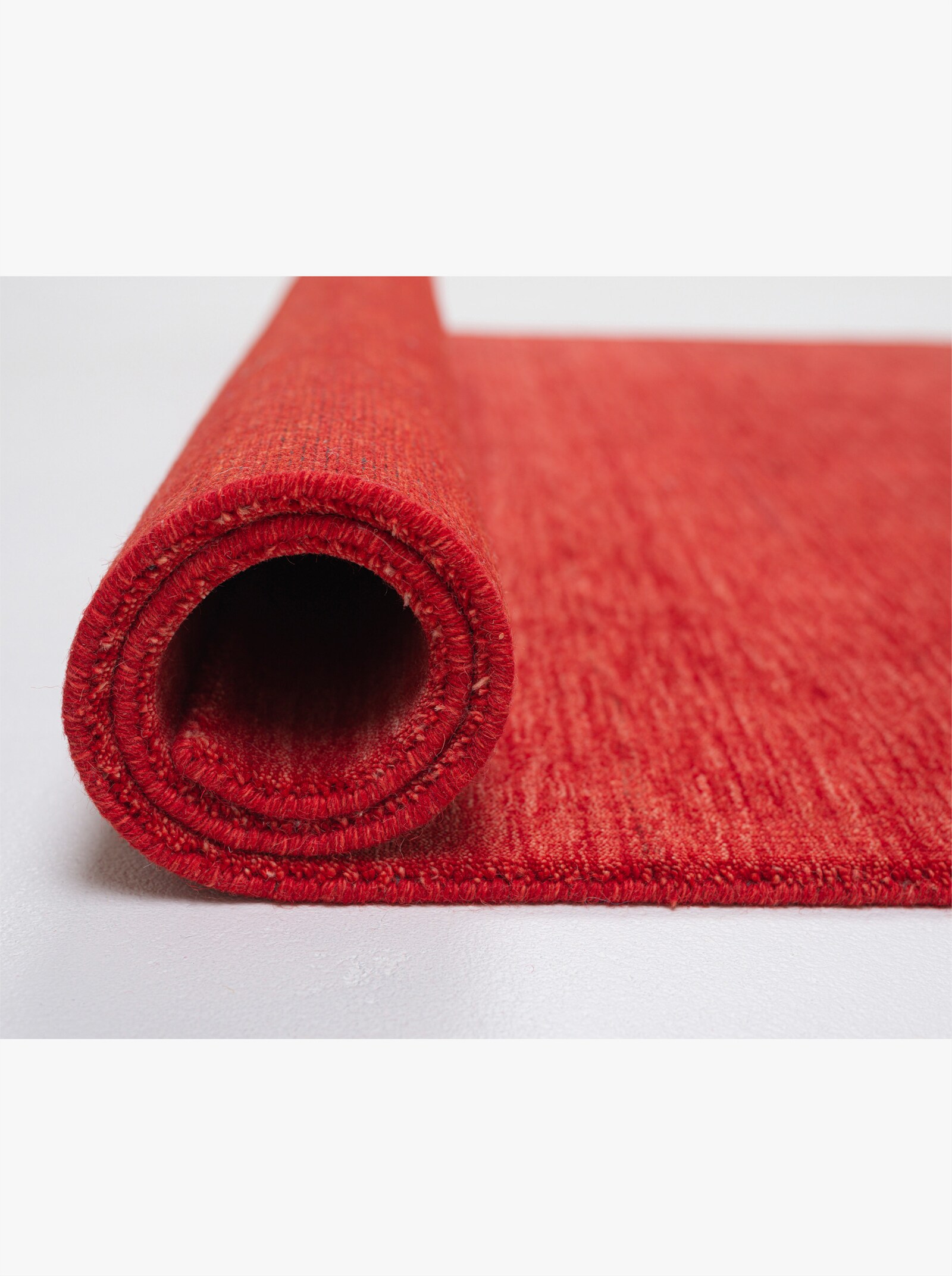 Theko Handwebteppich - rot