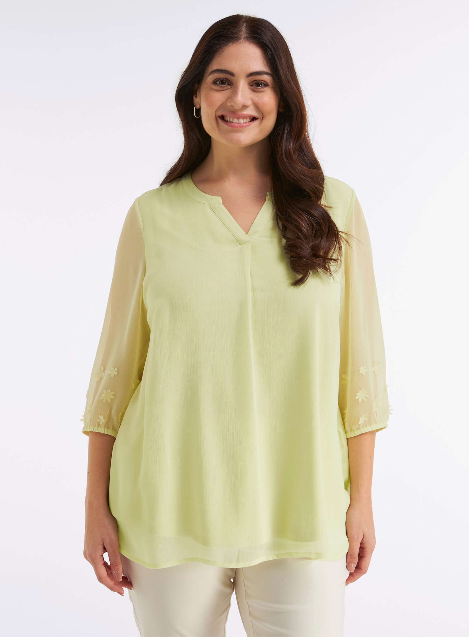 sheego Tunika mit Blüten-Applikationen am Ärmel - pistazie