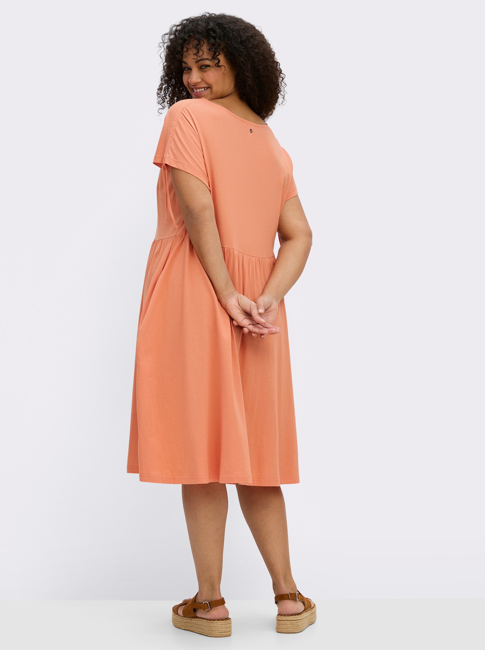 sheego Jerseyjurk met bloemenborduursel - papaya