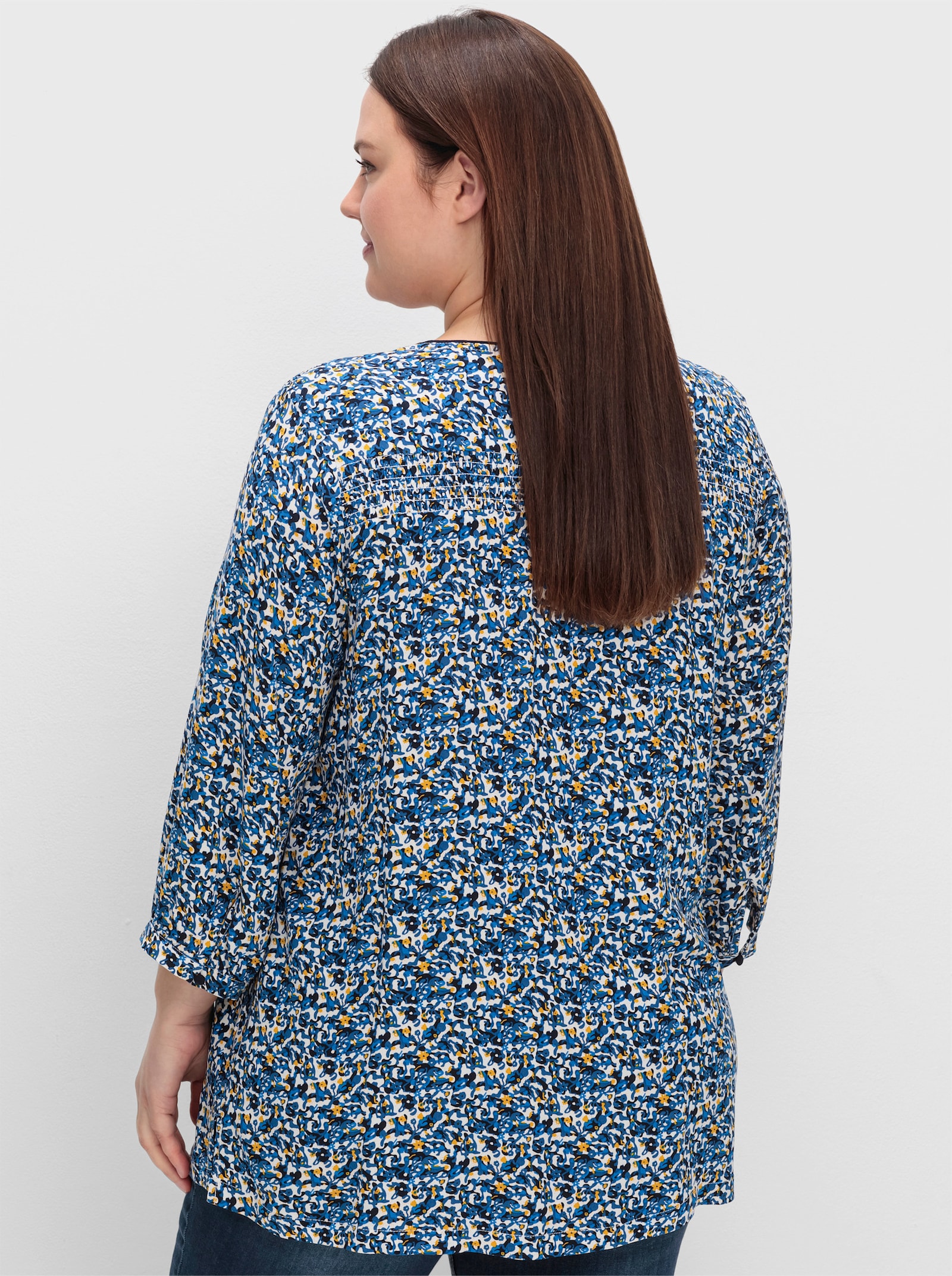 sheego Druckbluse mit Minimal-Alloverprint - tiefblau-gemustert