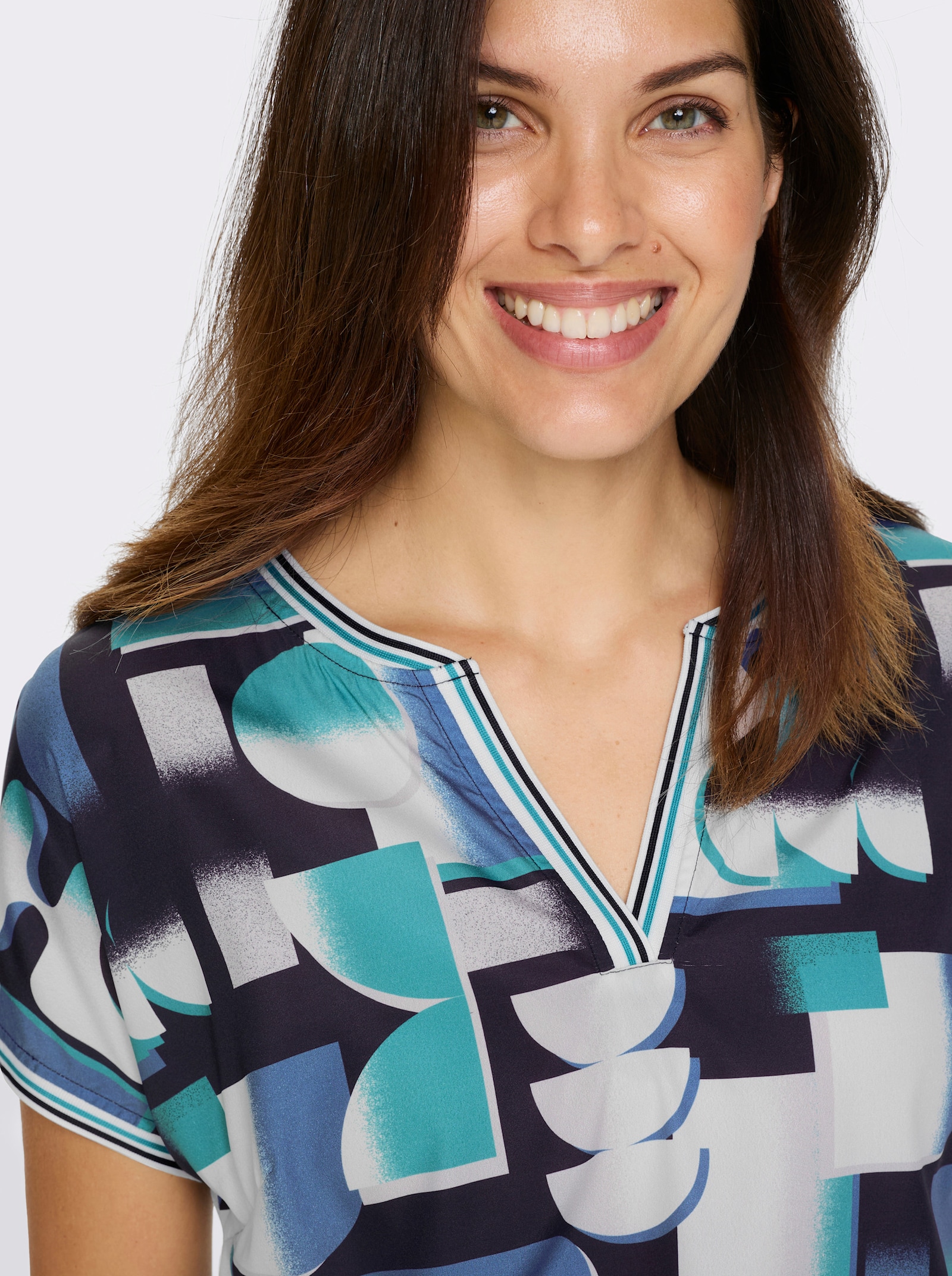 Schlupfbluse im Grafik-Dessin - türkis-schwarz-bedruckt