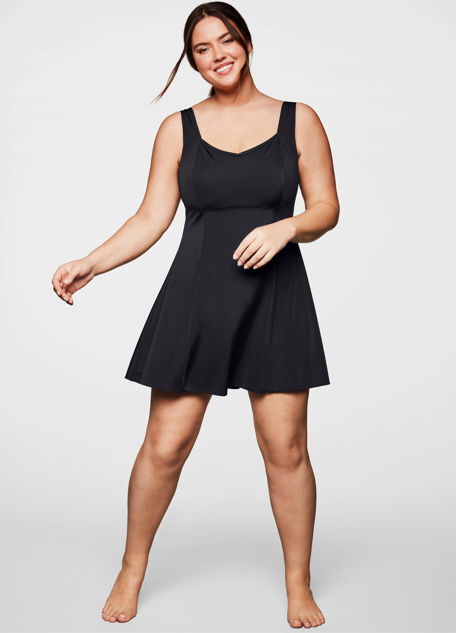 sheego Badekleid mit integrierter Hose und Shaping-Effekt - schwarz