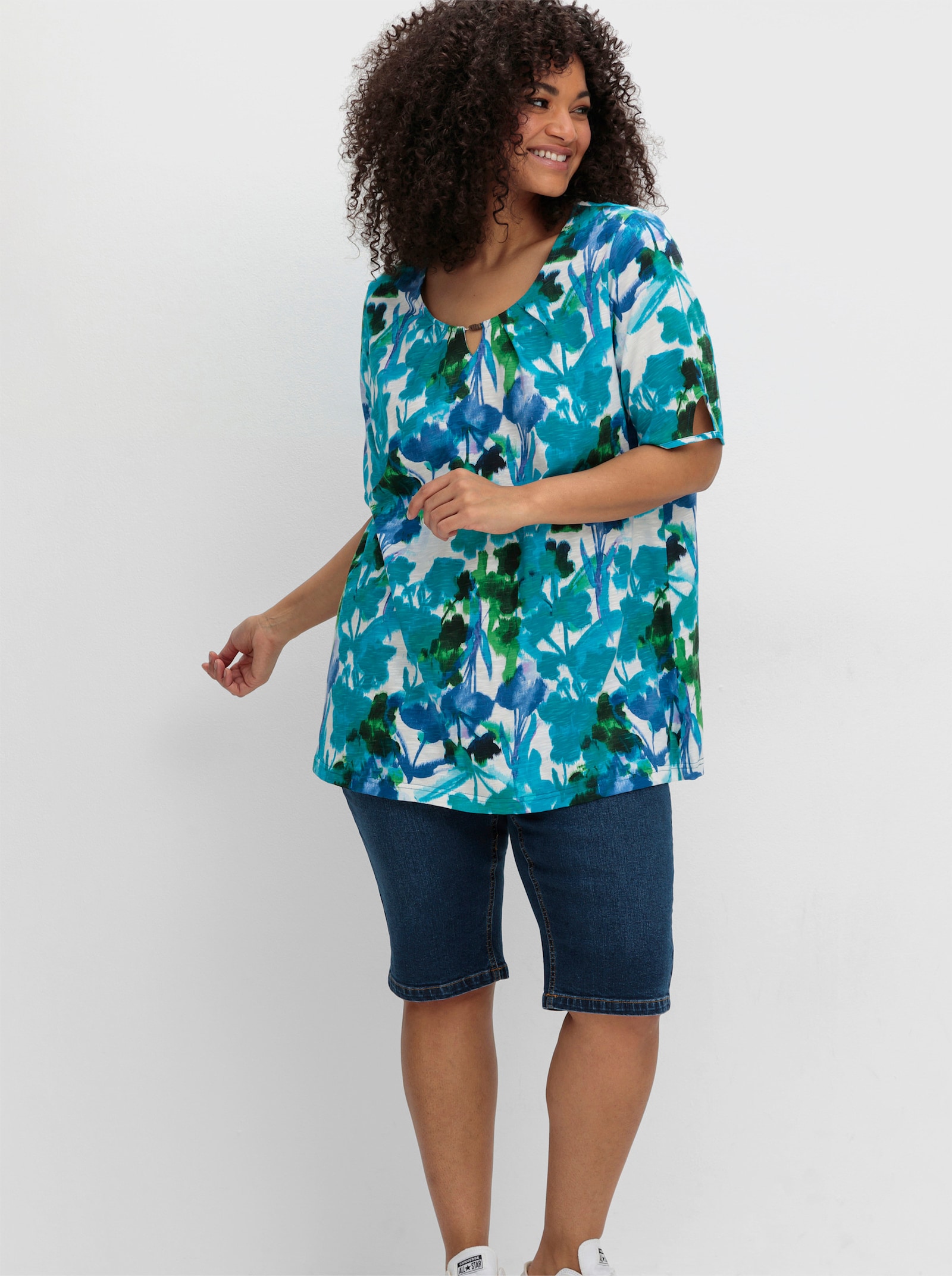 sheego Kurzarmshirt in A-Linie - türkis-gemustert