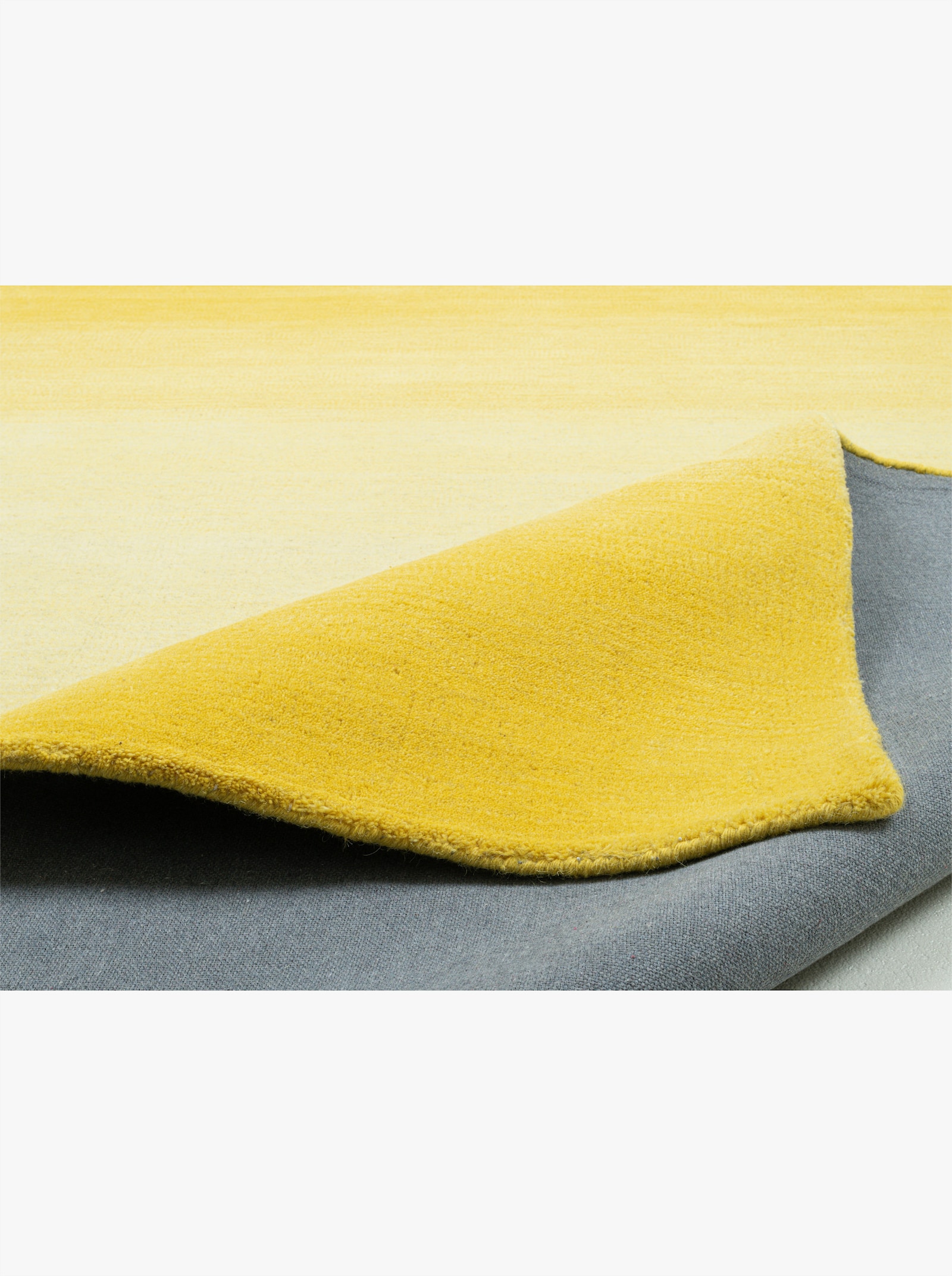 Theko Handwebteppich - gelb