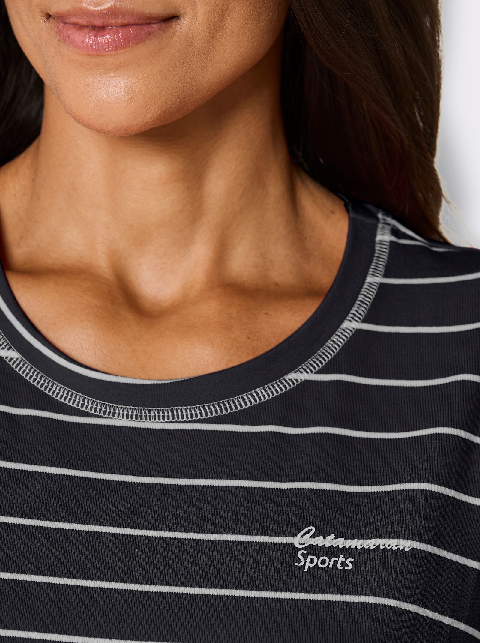 Catamaran Sports Funktionsshirt mit Seitenschlitzen - schwarz-weiß-geringelt