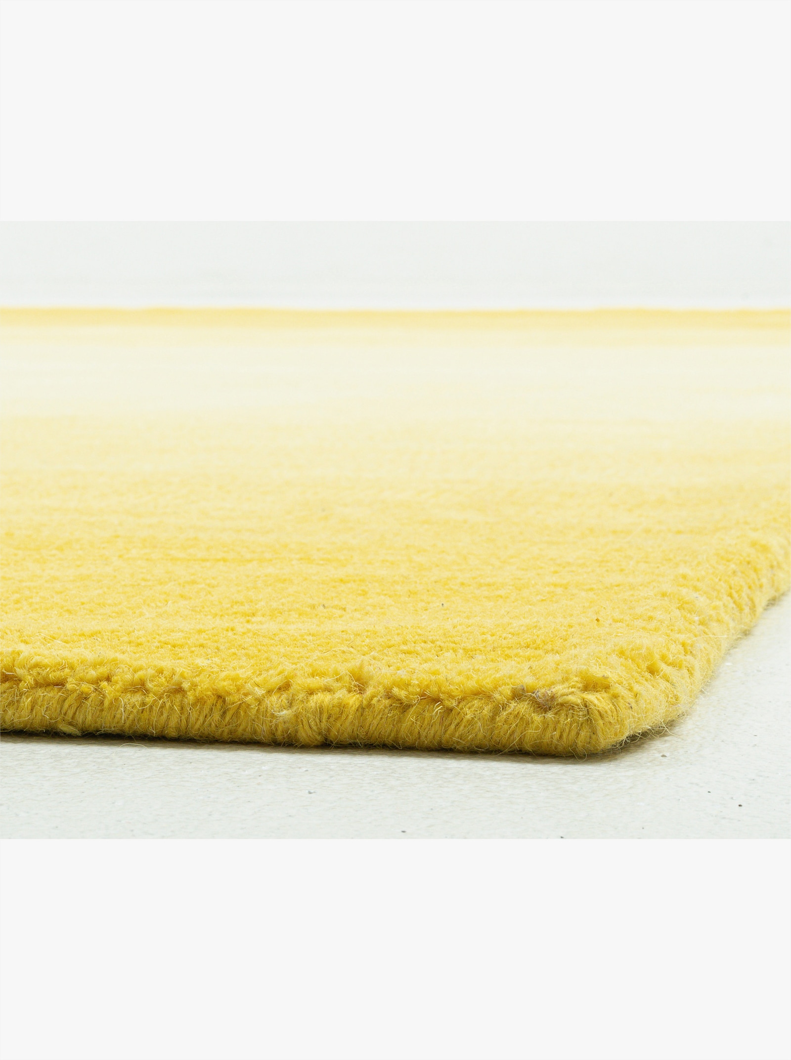 Theko Handwebteppich - gelb