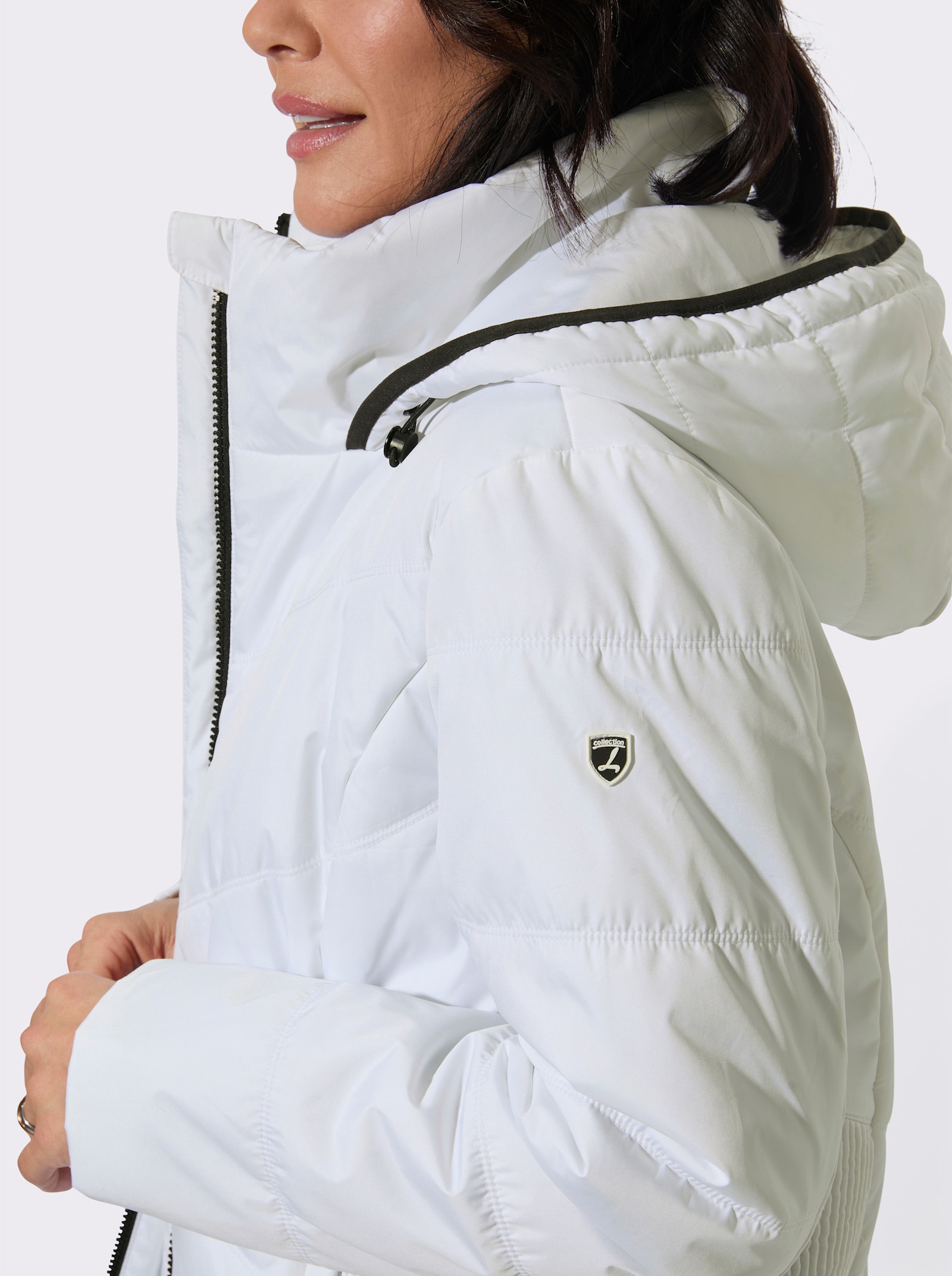 Steppjacke mit gesmokten Seitenpartien - weiss