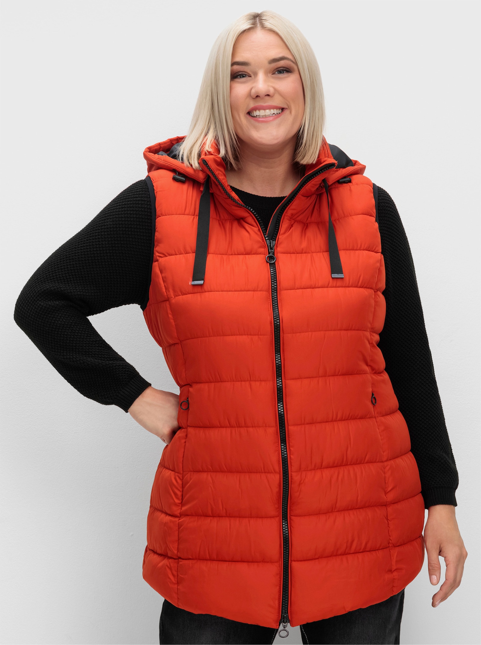 Steppweste mit abzippbarer Kapuze - rostrot