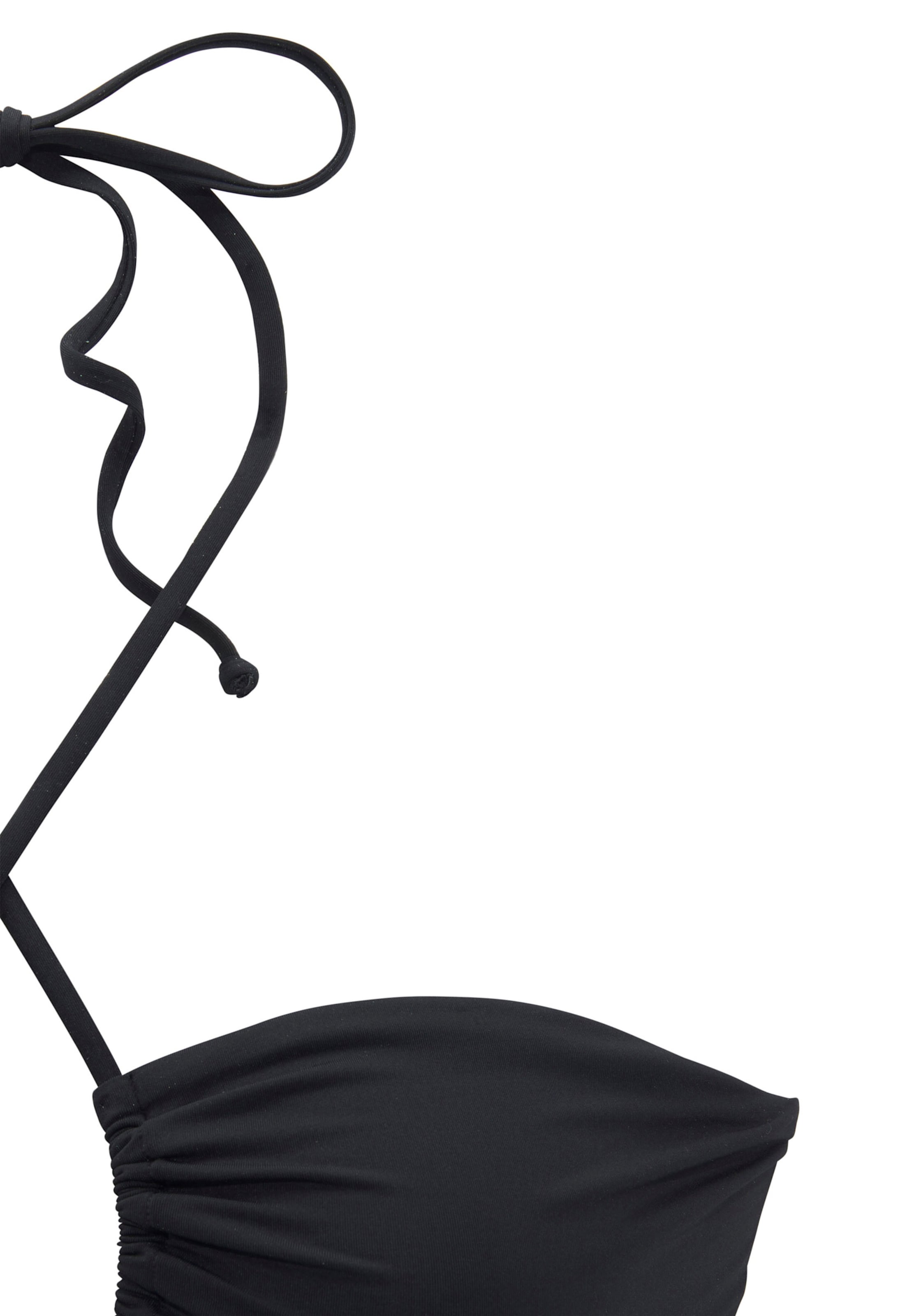 TC CD günstig Kaufen-Badeanzug in schwarz von LASCANA. Badeanzug in schwarz von LASCANA <![CDATA[Schicker Badeanzug von Lascana. Raffinierte Schnittführung mit Cut-outs, Raffungen und überkreuz verlaufendem Necklace. Bustier mit herausnehmbaren Softcups und seitlichen Stäb
