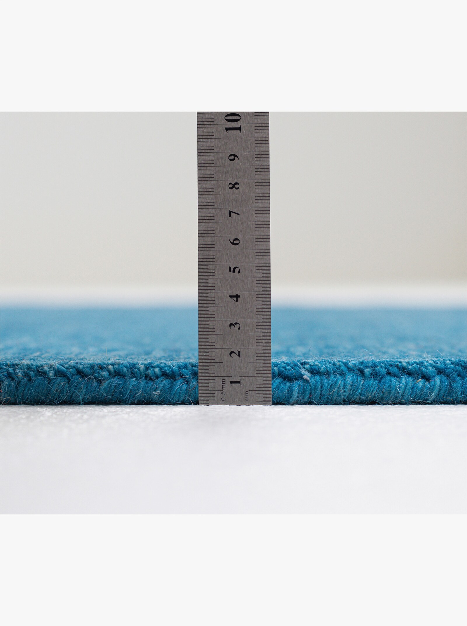 Theko Handwebteppich - blau