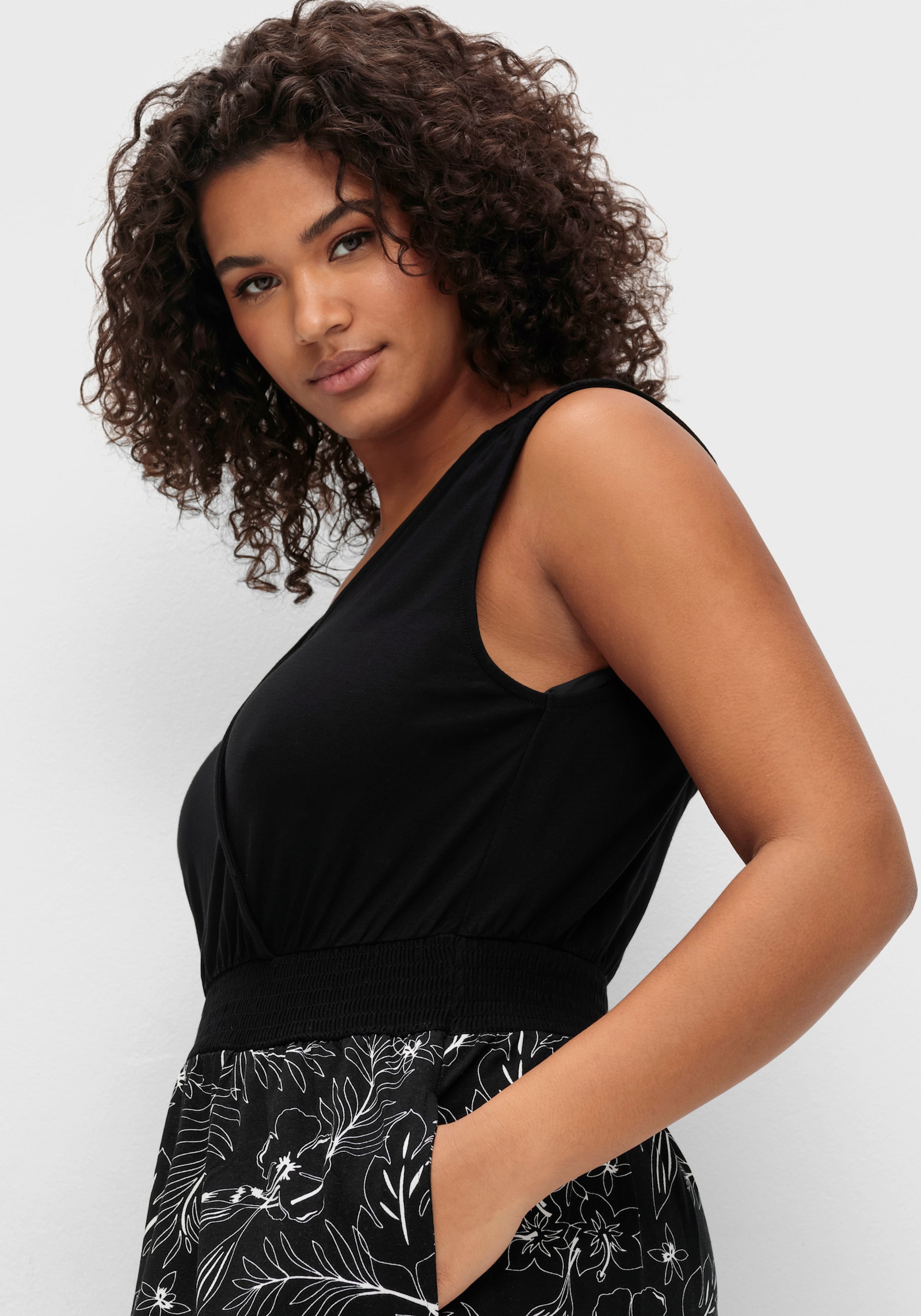 sheego Jerseykleid mit bedrucktem Rock - schwarz-gemustert