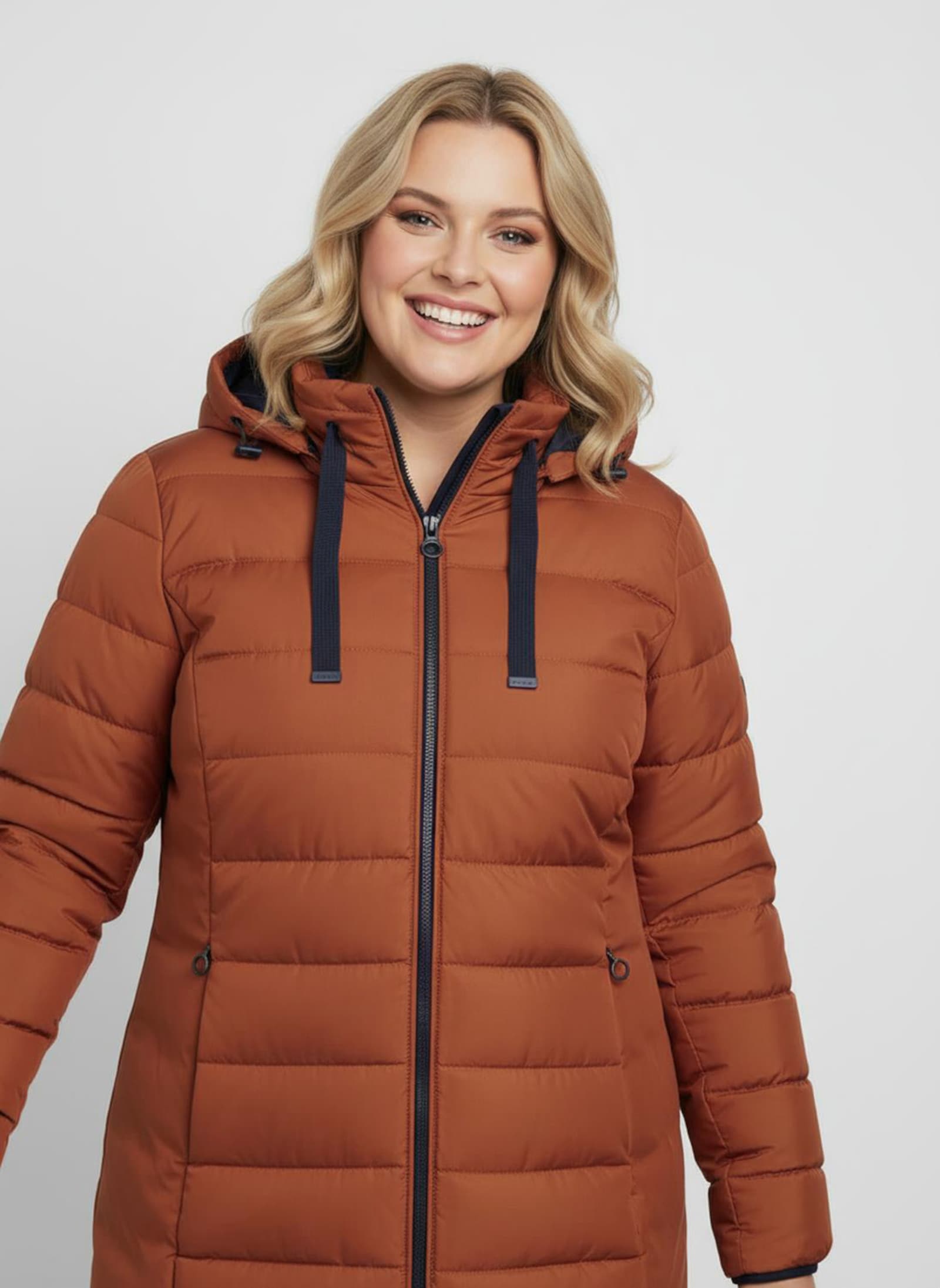 Steppjacke mit elastischer Kontrast-Paspelierung - rostrot