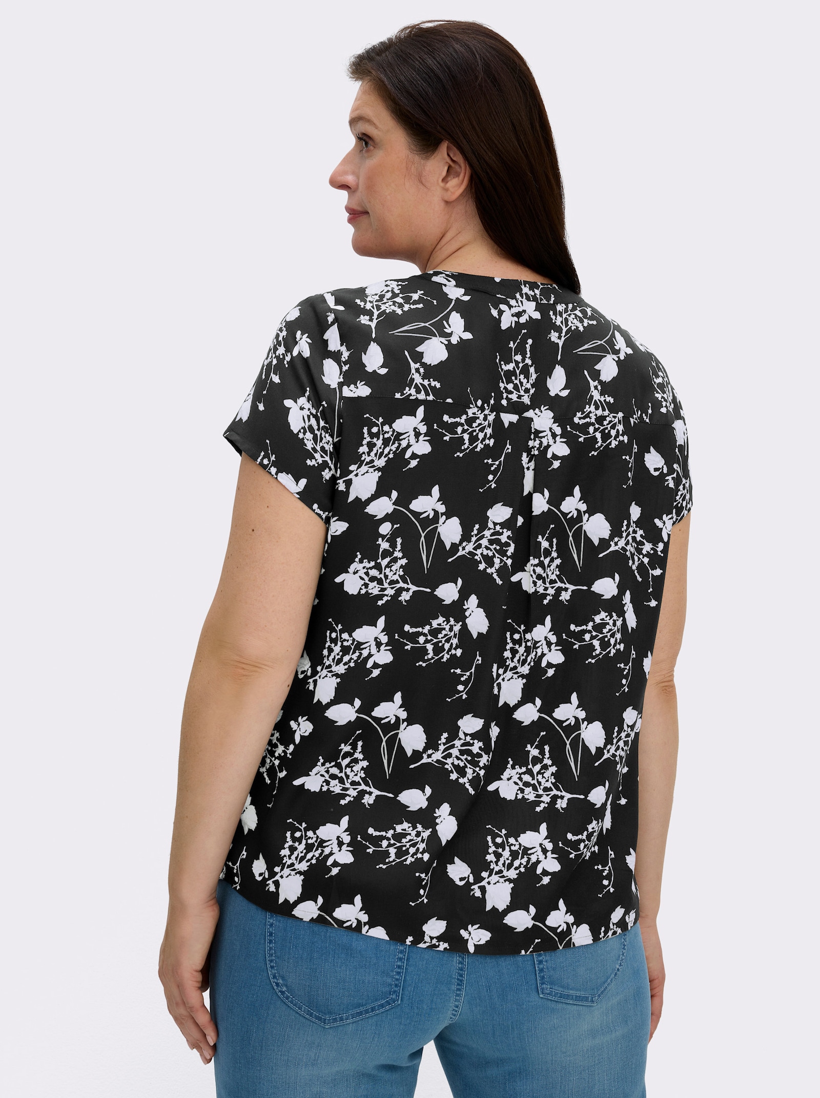 Kurzarm-Bluse mit floralem Druck - schwarz-weiß-gemustert