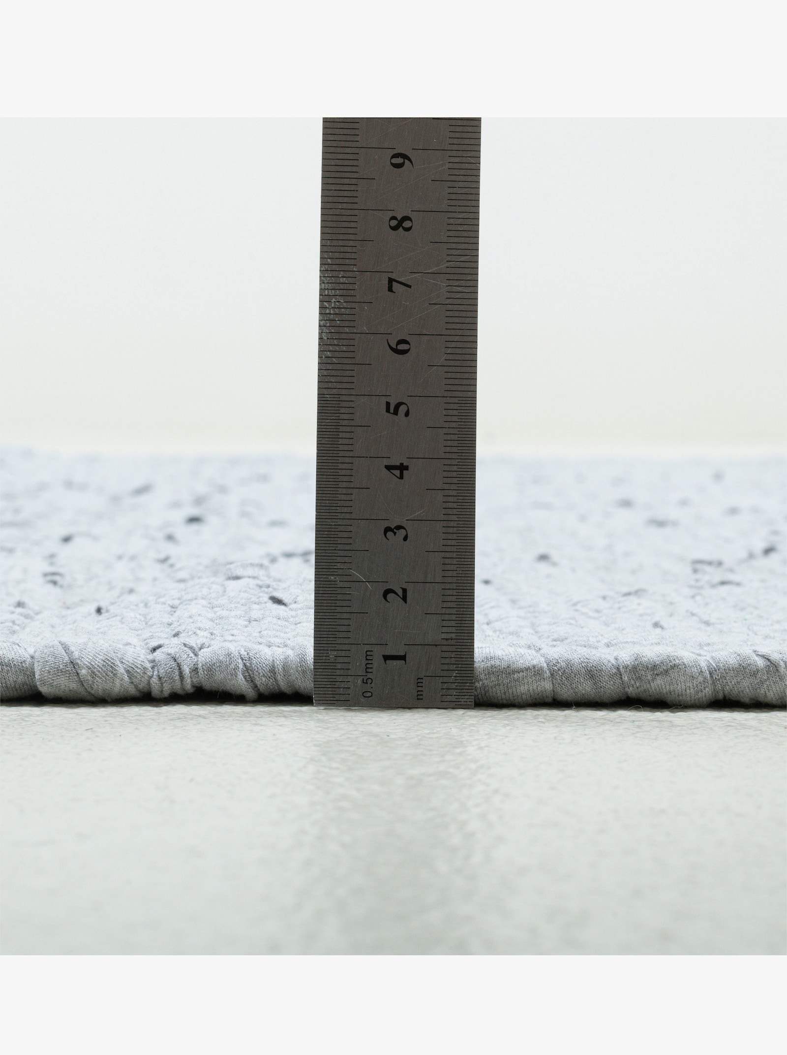 Theko Handwebteppich - grau