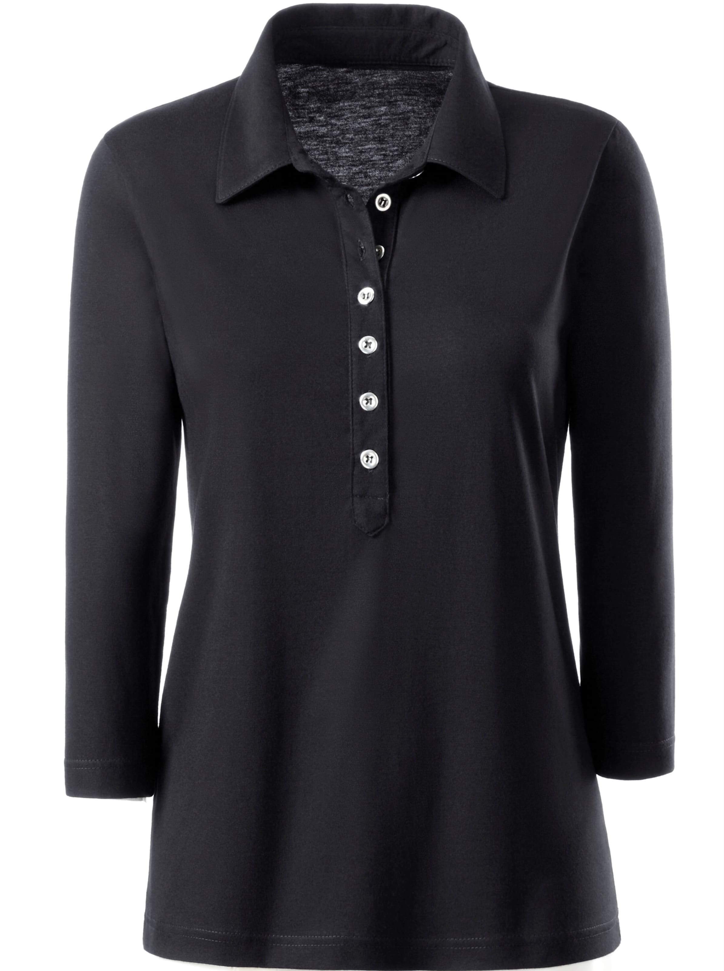 Lang Shirt  günstig Kaufen-Poloshirt in schwarz von heine. Poloshirt in schwarz von heine <![CDATA[Poloshirt in weicher Qualität. Modisch lange Knopfleiste mit silberfarbenen Knöpfen. 3/4-­Ärmel. OCS-zertifiziertes Produkt.]]>. 
