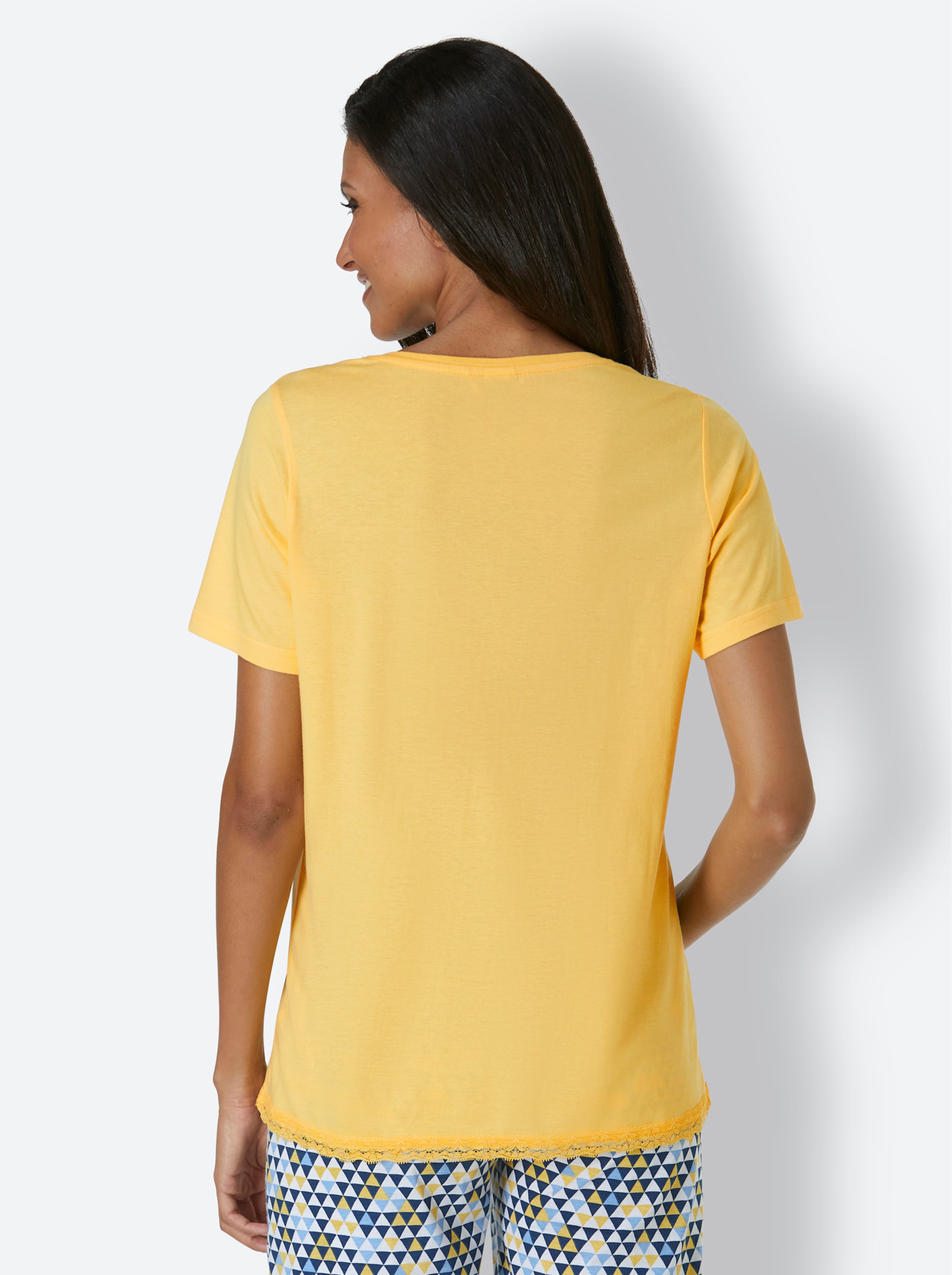 Shirt I günstig Kaufen-Schlafanzug-Shirt in gelb von wäschepur. Schlafanzug-Shirt in gelb von wäschepur <![CDATA[Die zarte Spitze am Saum schenkt diesem kombifreudigen Schlafanzug-Shirt einen Hauch Eleganz. Aus herrlich weichem Single-Jersey.]]>. 