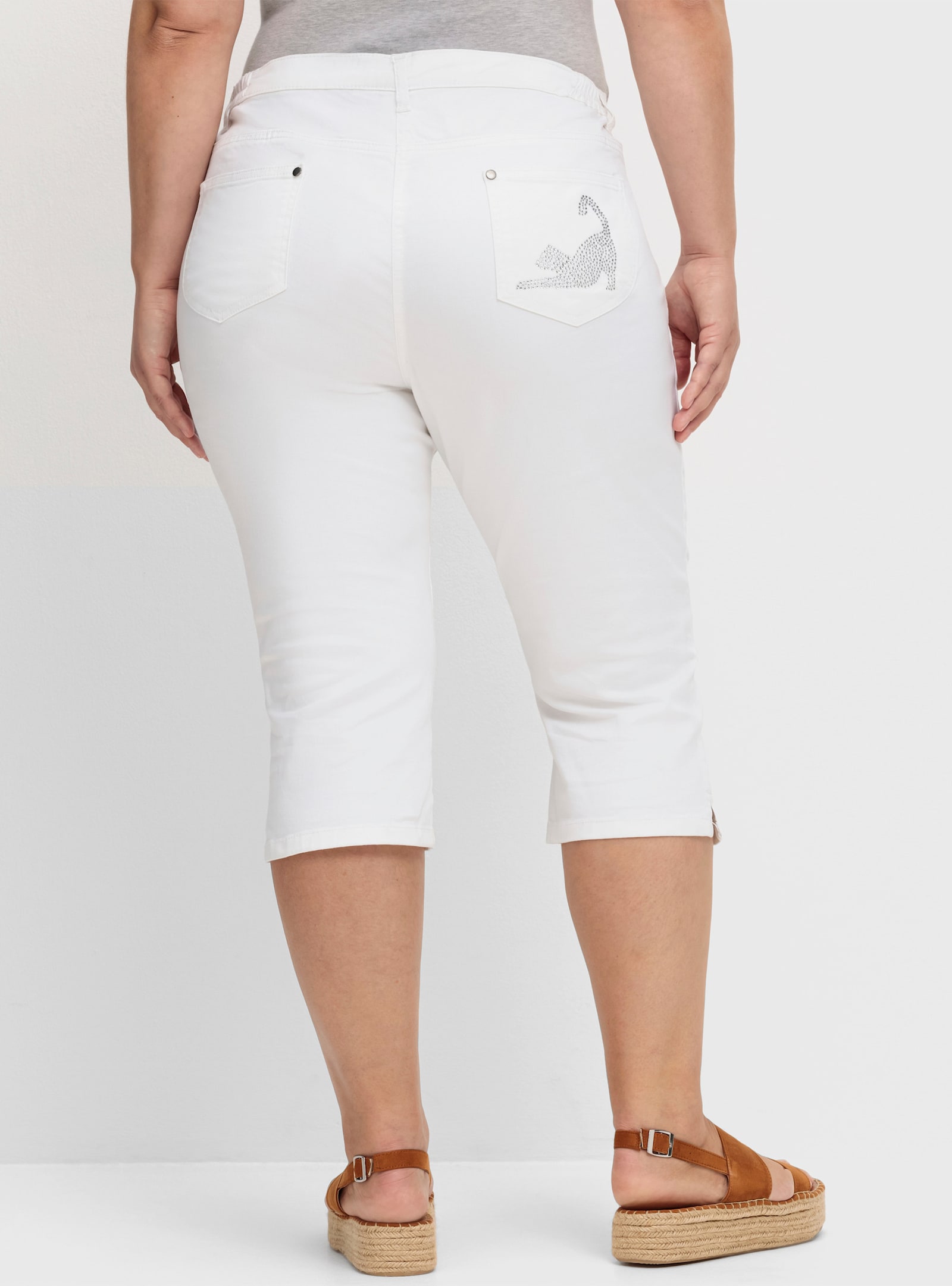 Caprijeans mit glitzerndem Katzenmotiv - weiß