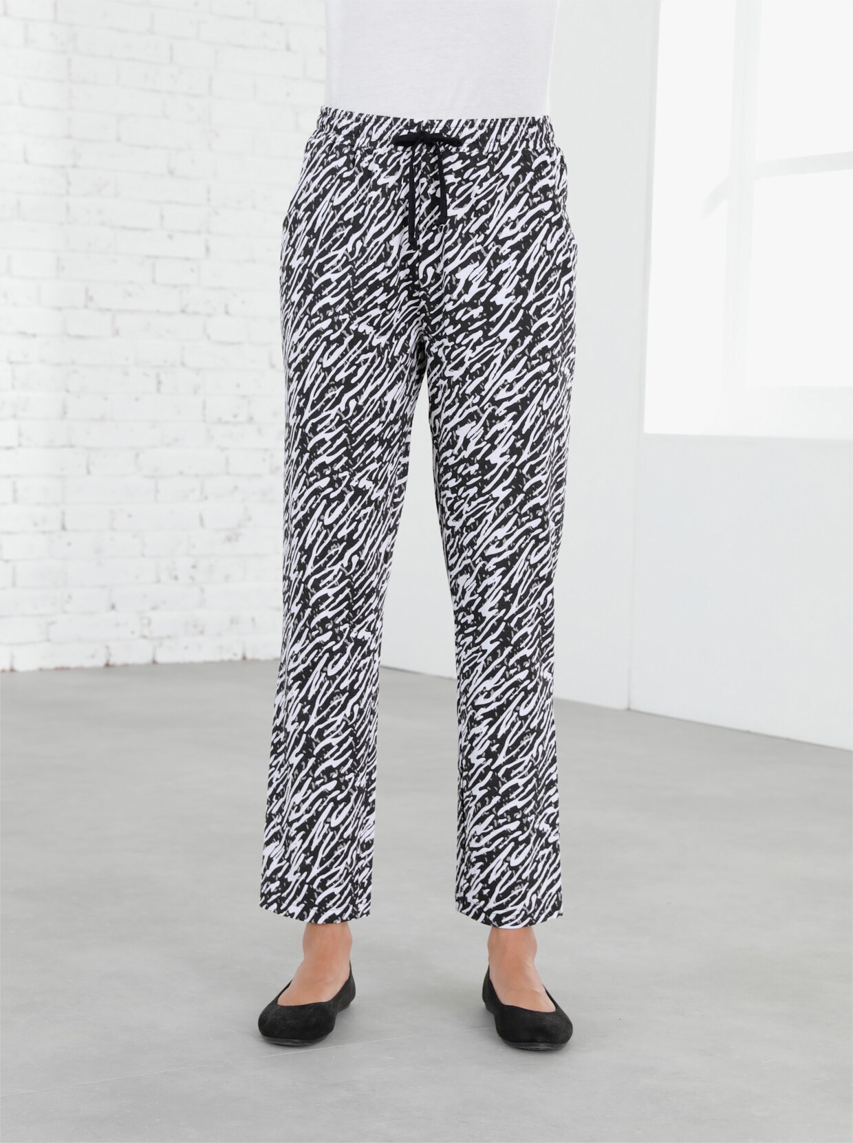 Vrijetijdsbroek - zwart/wit geprint