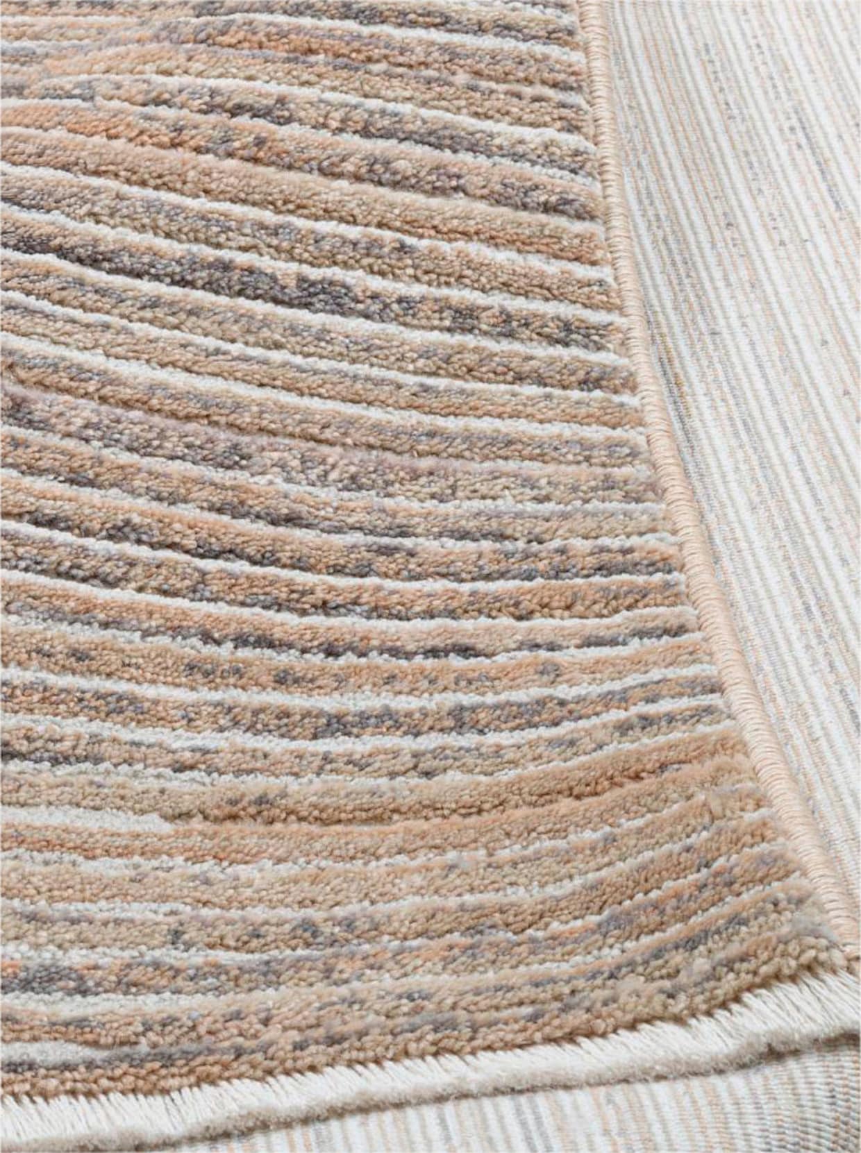 Theko Teppich - beige-meliert